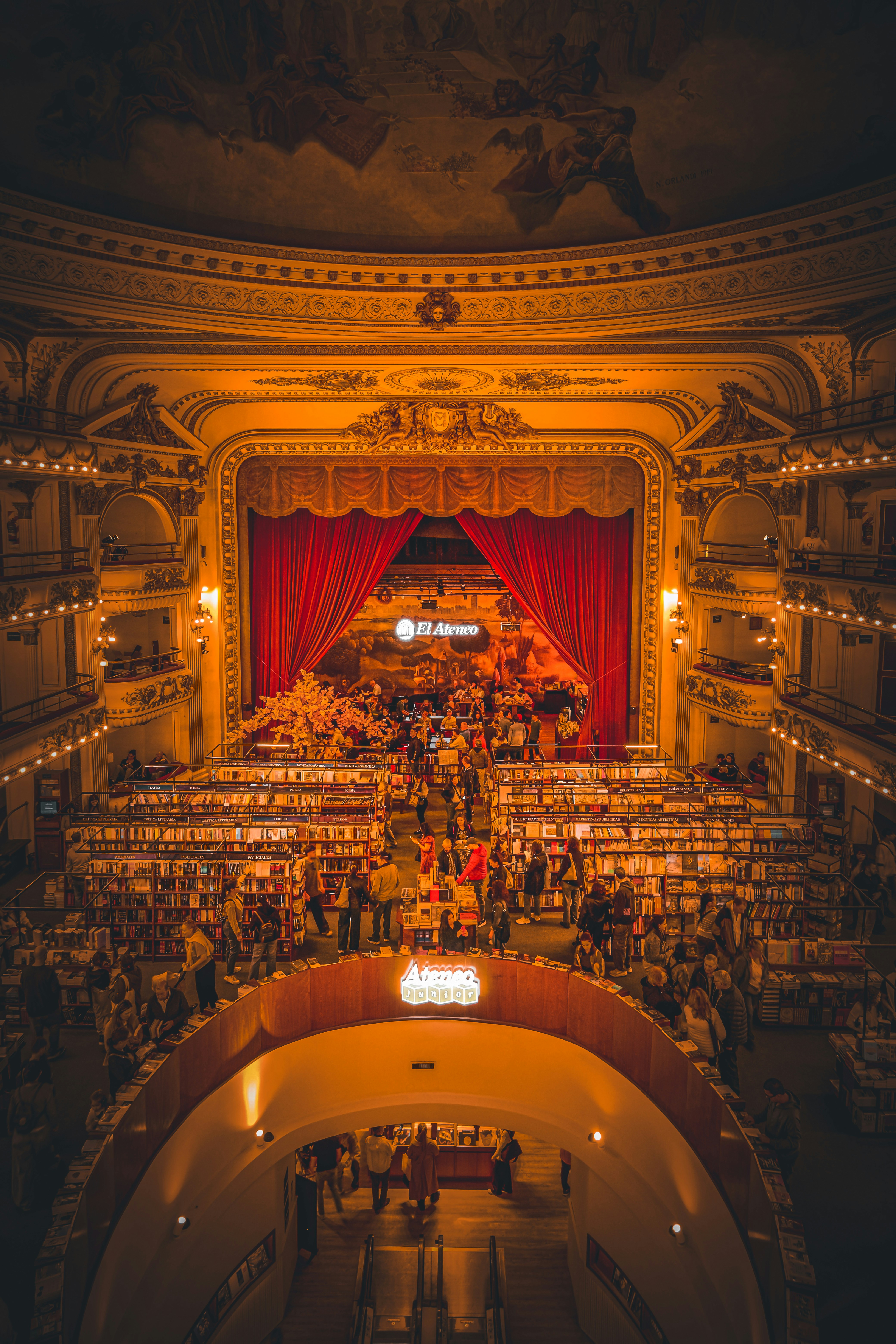 Grand theater filled with books and people