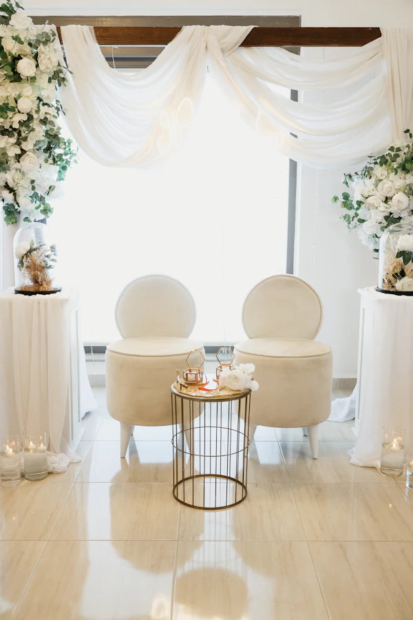Nashville wedding venue - Two elegant chairs flank a small table.