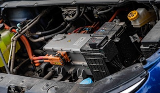 Electric car engine with visible wiring and battery components