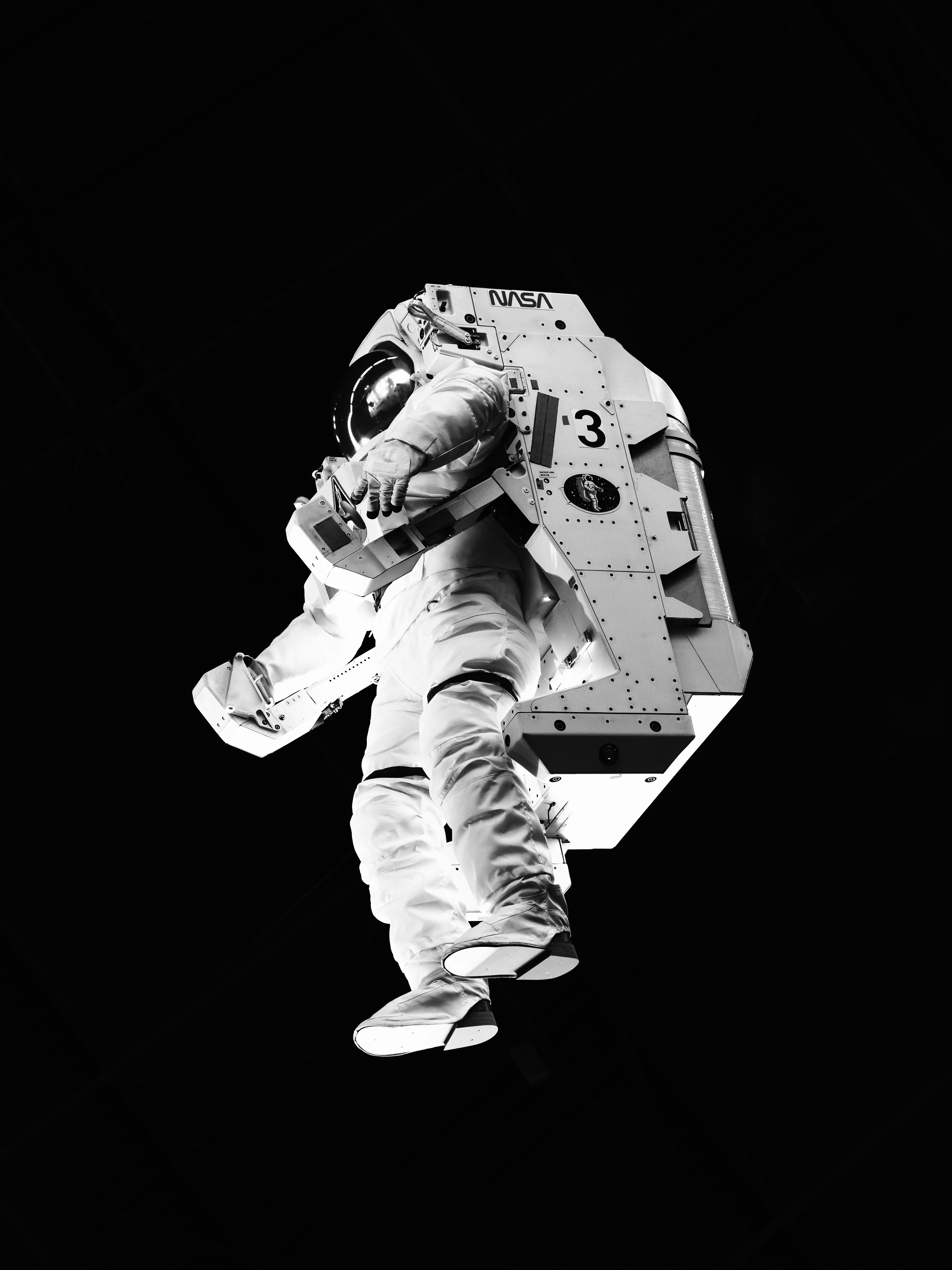 Astronaut in a white spacesuit with a jetpack