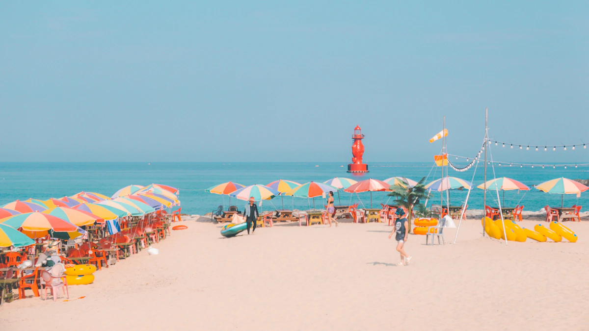 Colorful beach umbrellas lined up on the sand at Haeundae Beach in Busan