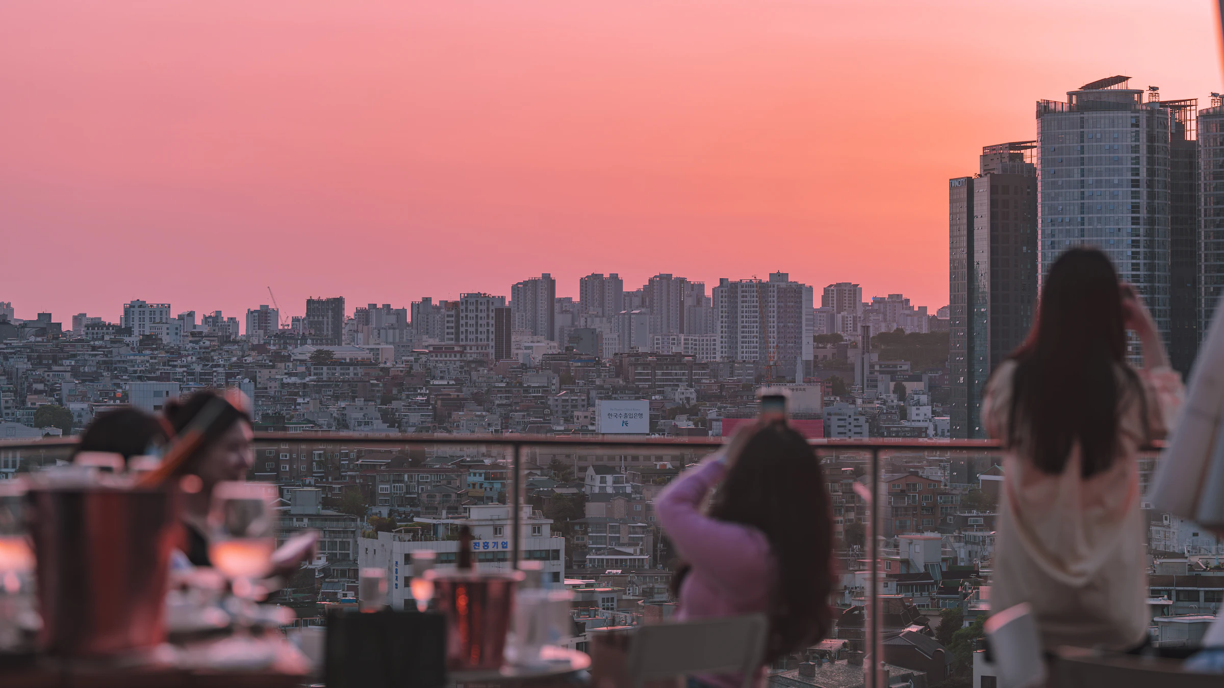Housemates watching the sunset from the BASERA rooftop
