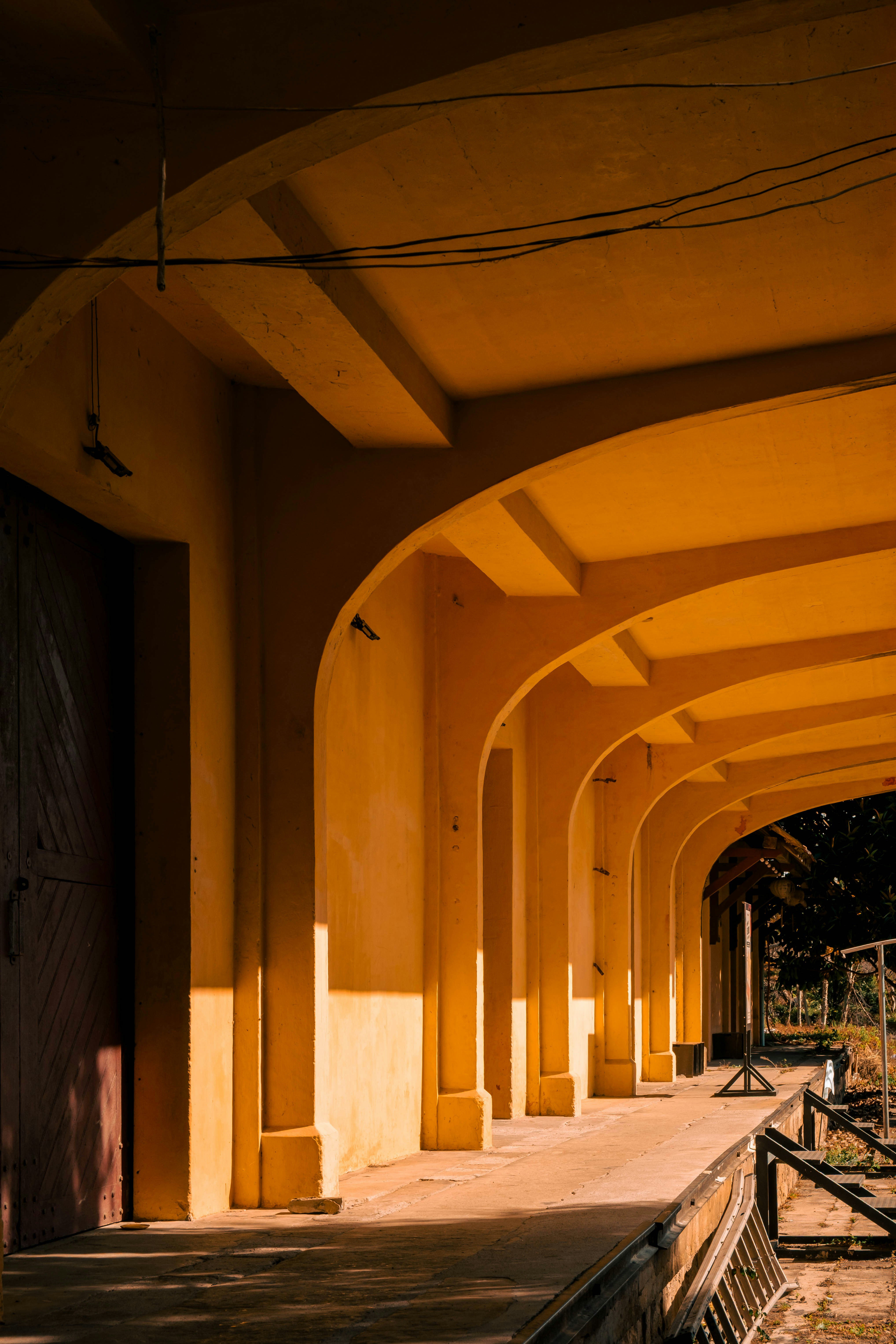 Yellow arches with strong sunlight and shadows