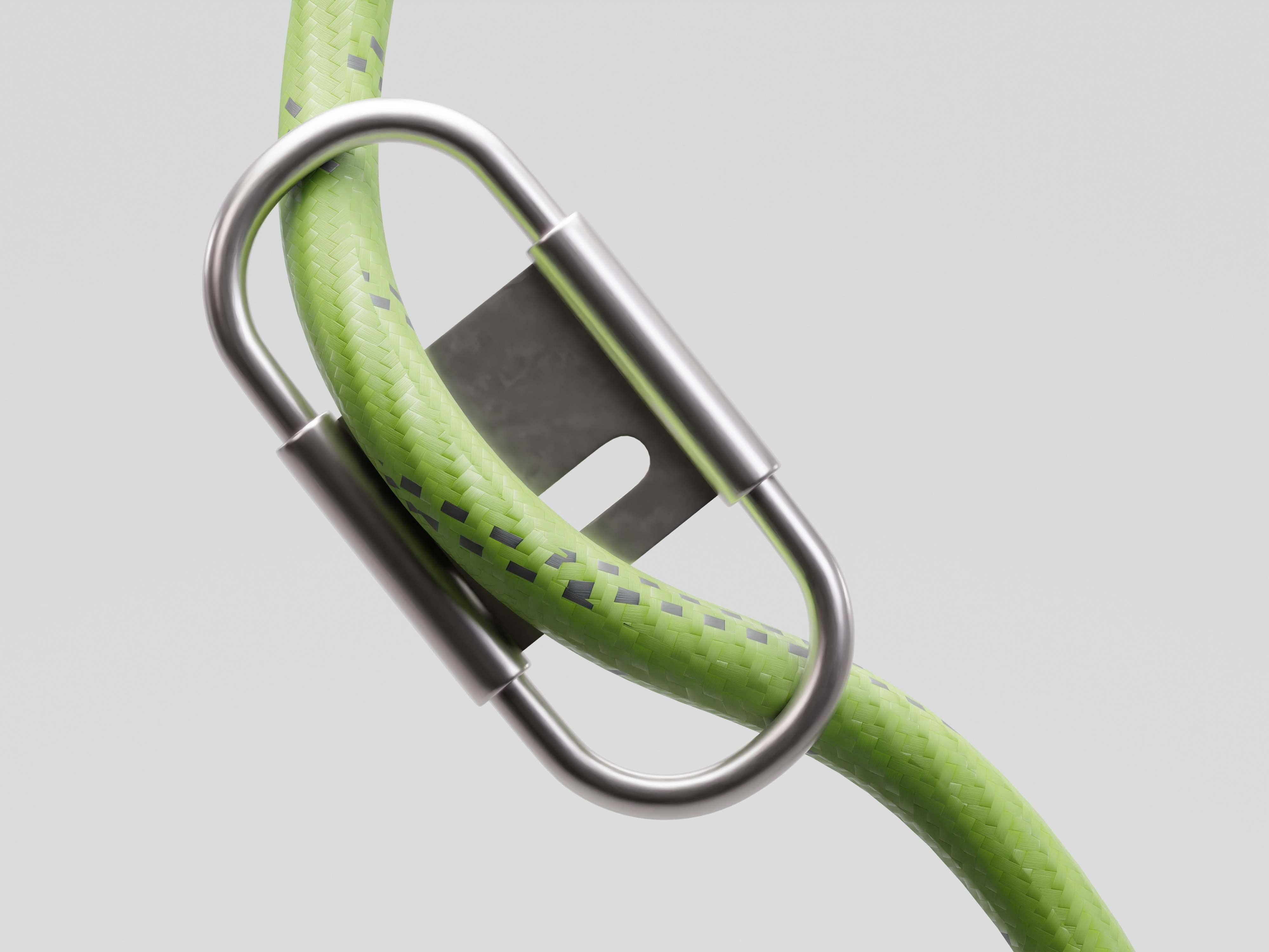 A metal carabiner attached to a green rope