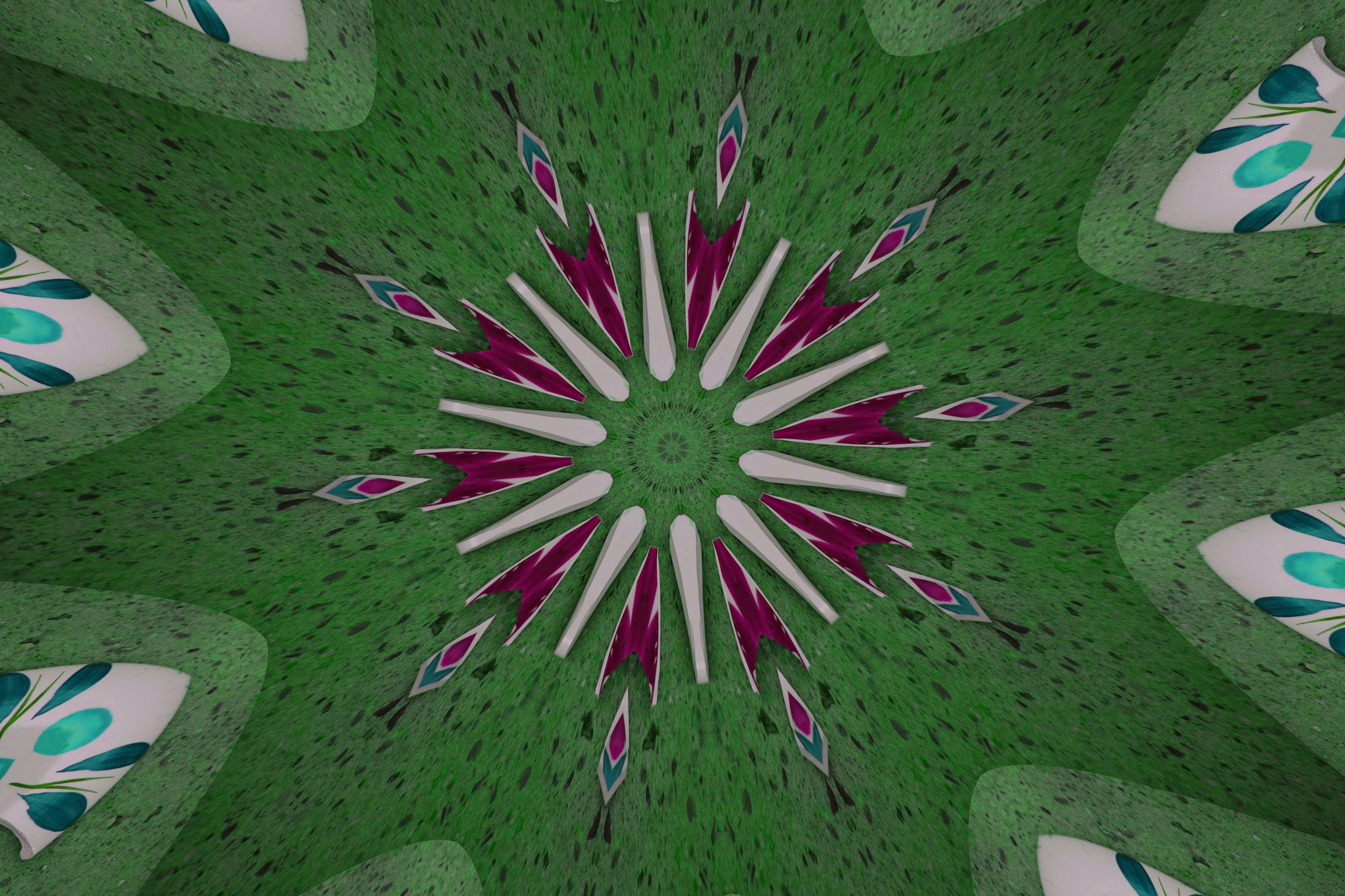 Green kaleidoscope pattern with starburst center