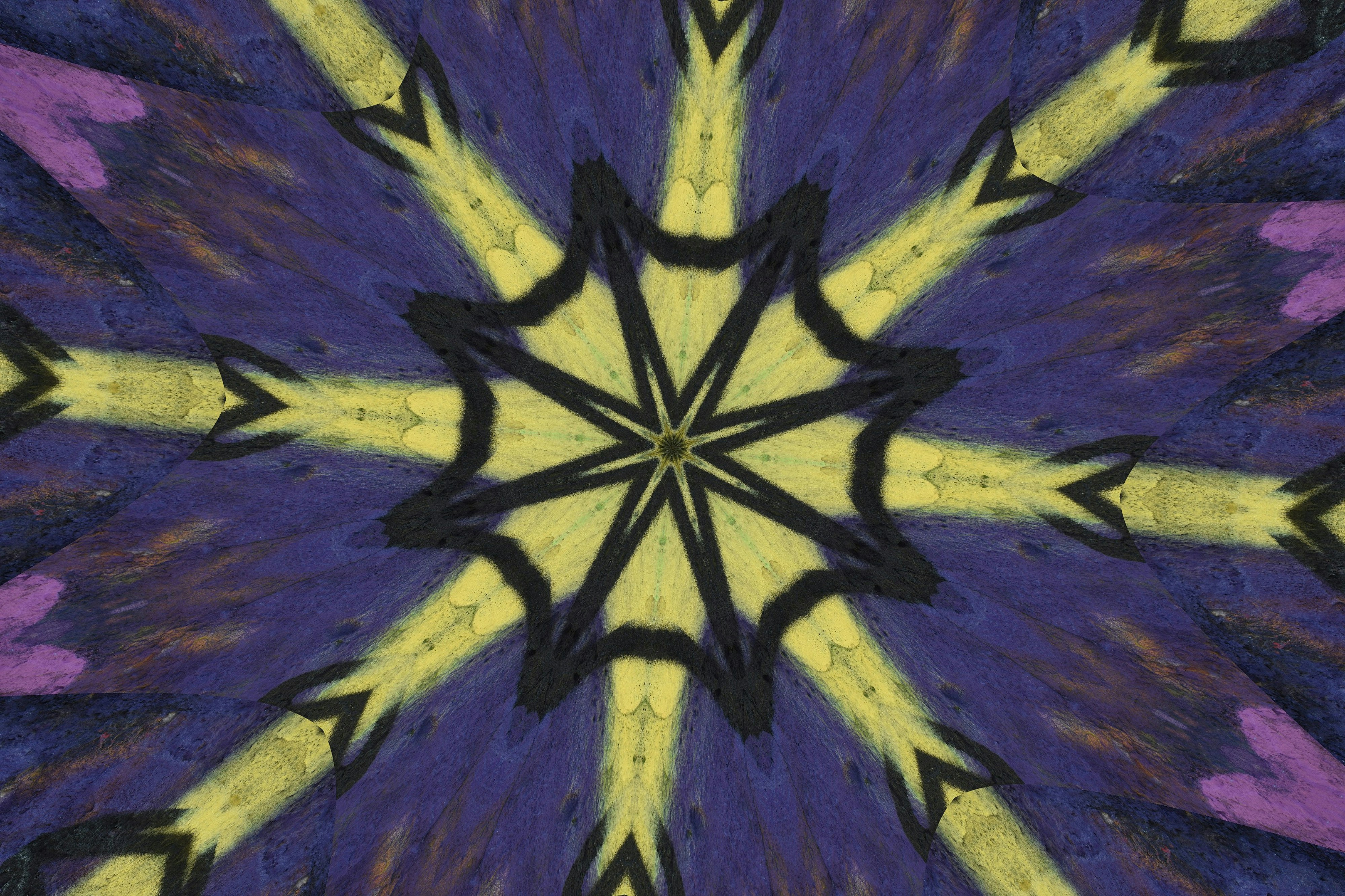 Abstract kaleidoscope pattern with yellow and purple colors