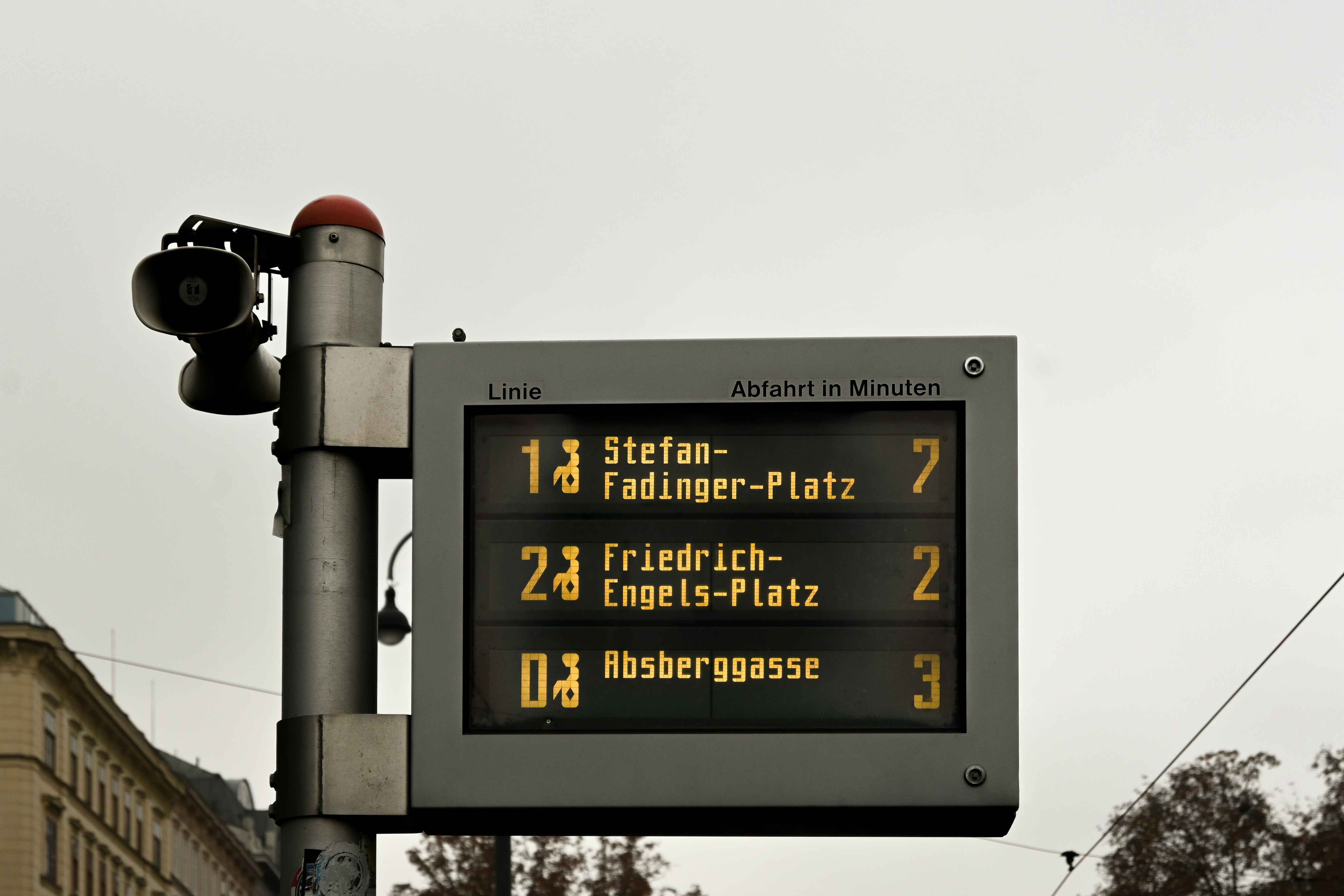 Digital public transport display showing destinations and times