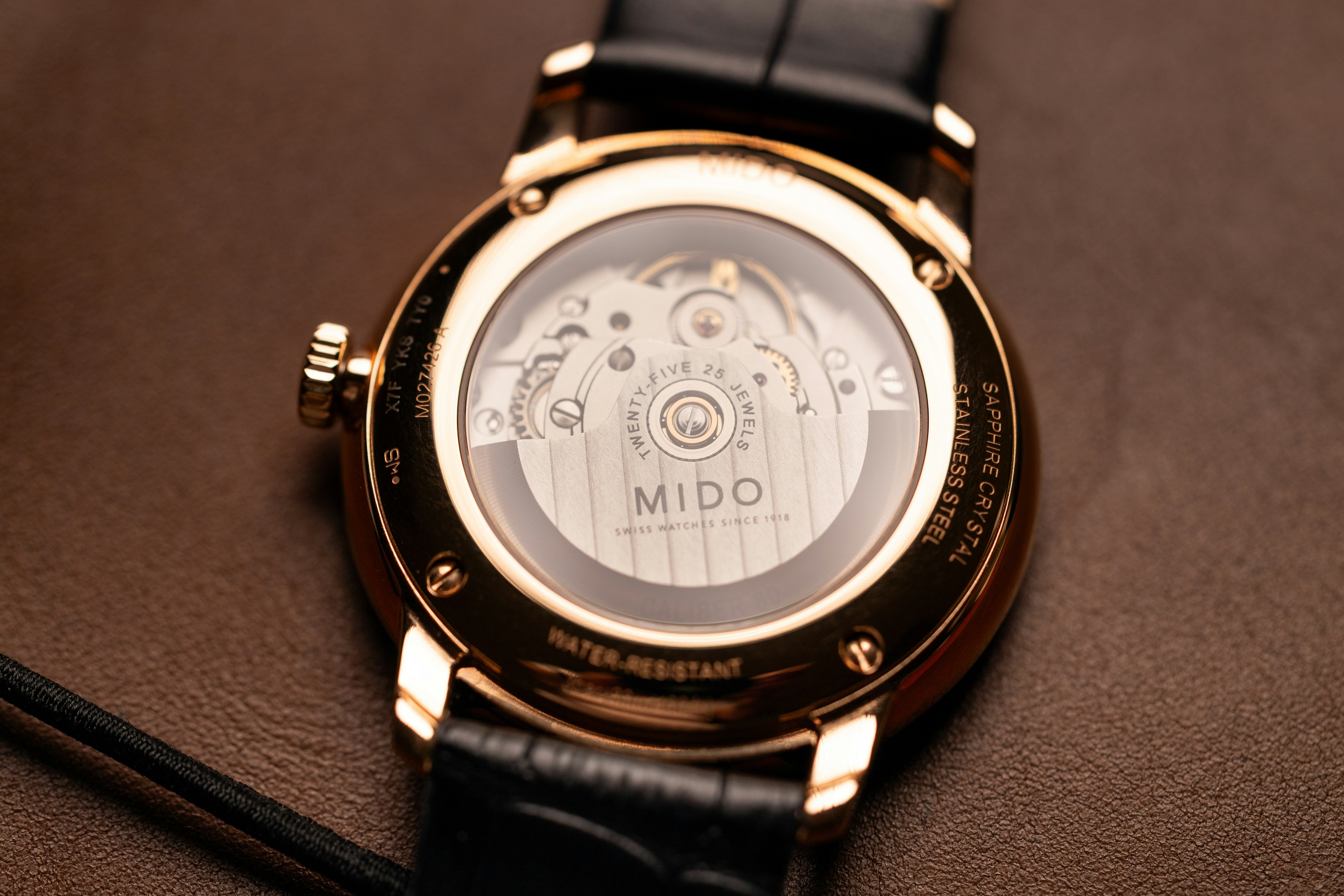 Close-up of a watch's intricate mechanical movement.