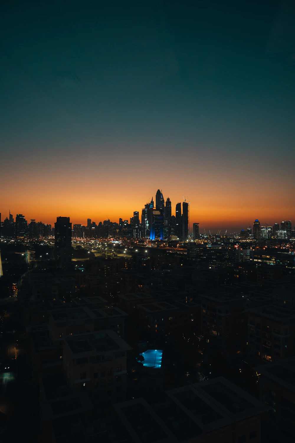 Dubai skyline glowing at sunset