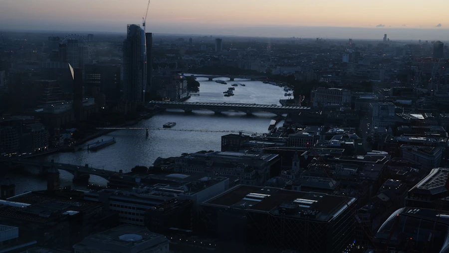 Aerial view of London at dusk with the River Thames
