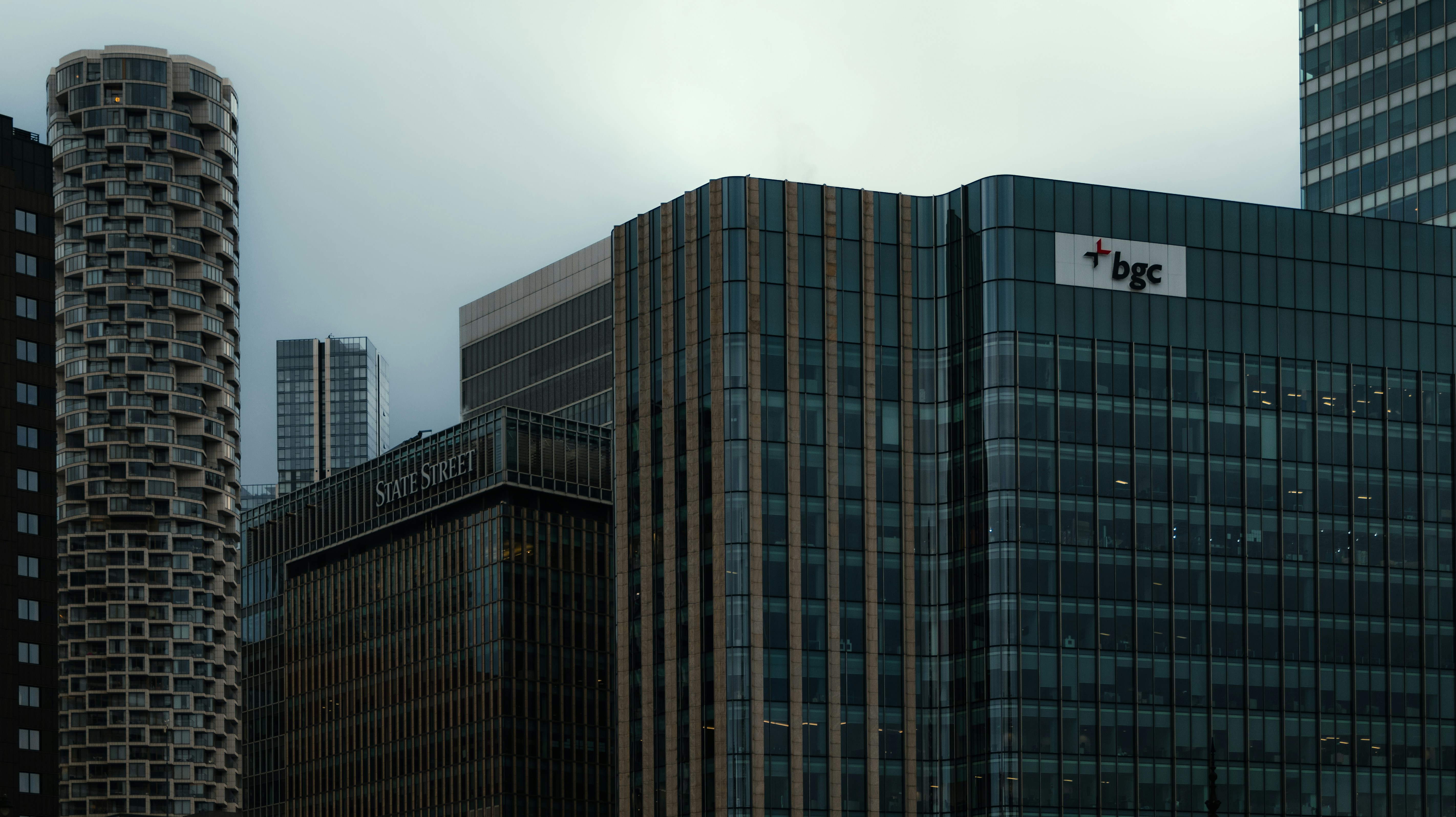 Modern glass office buildings in London's Canary Wharf