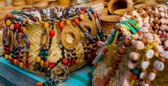 Woven baskets decorated with colorful beads and charms