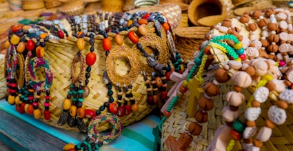 Woven baskets decorated with colorful beads and charms