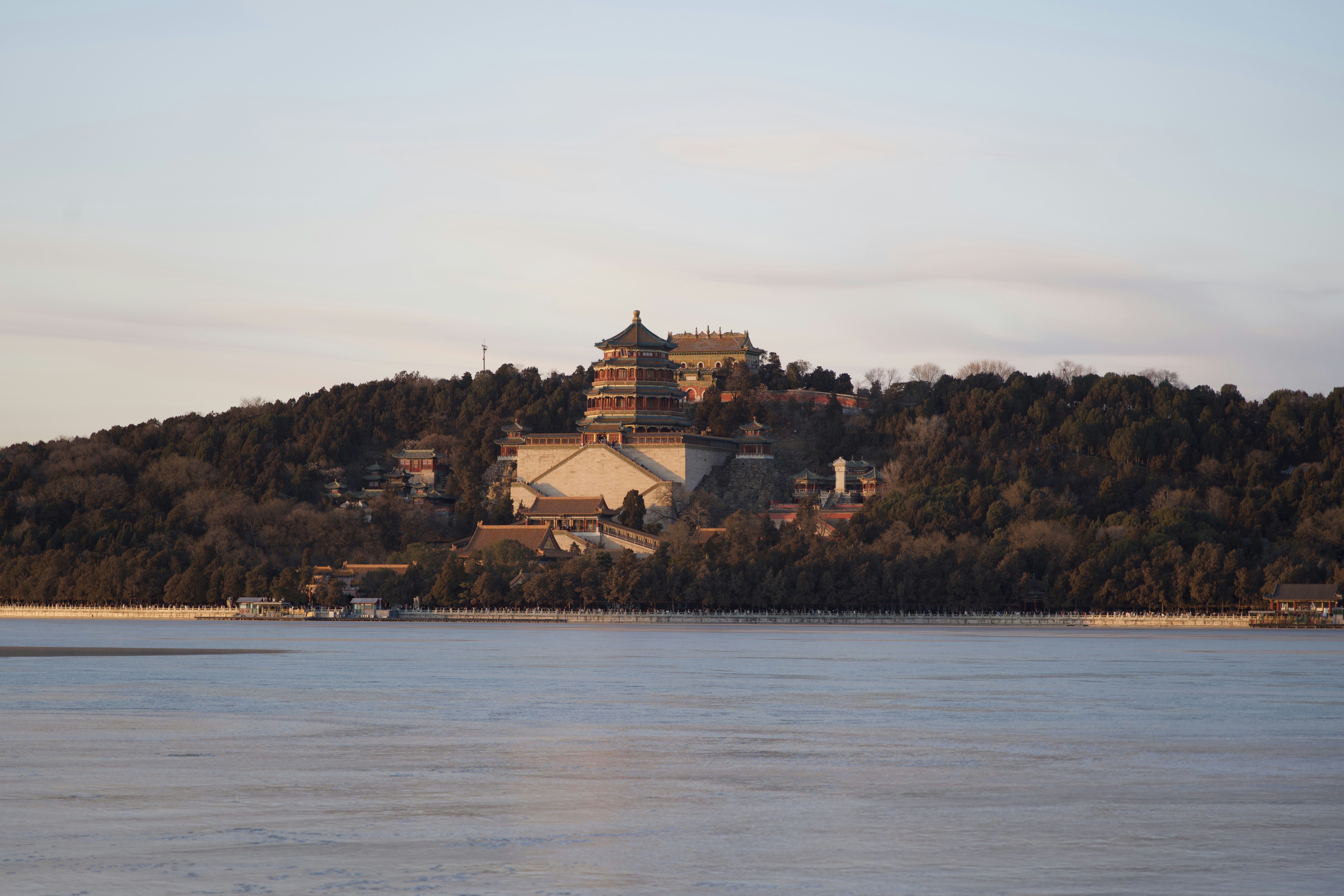 Palace on a hill overlooking a body of water