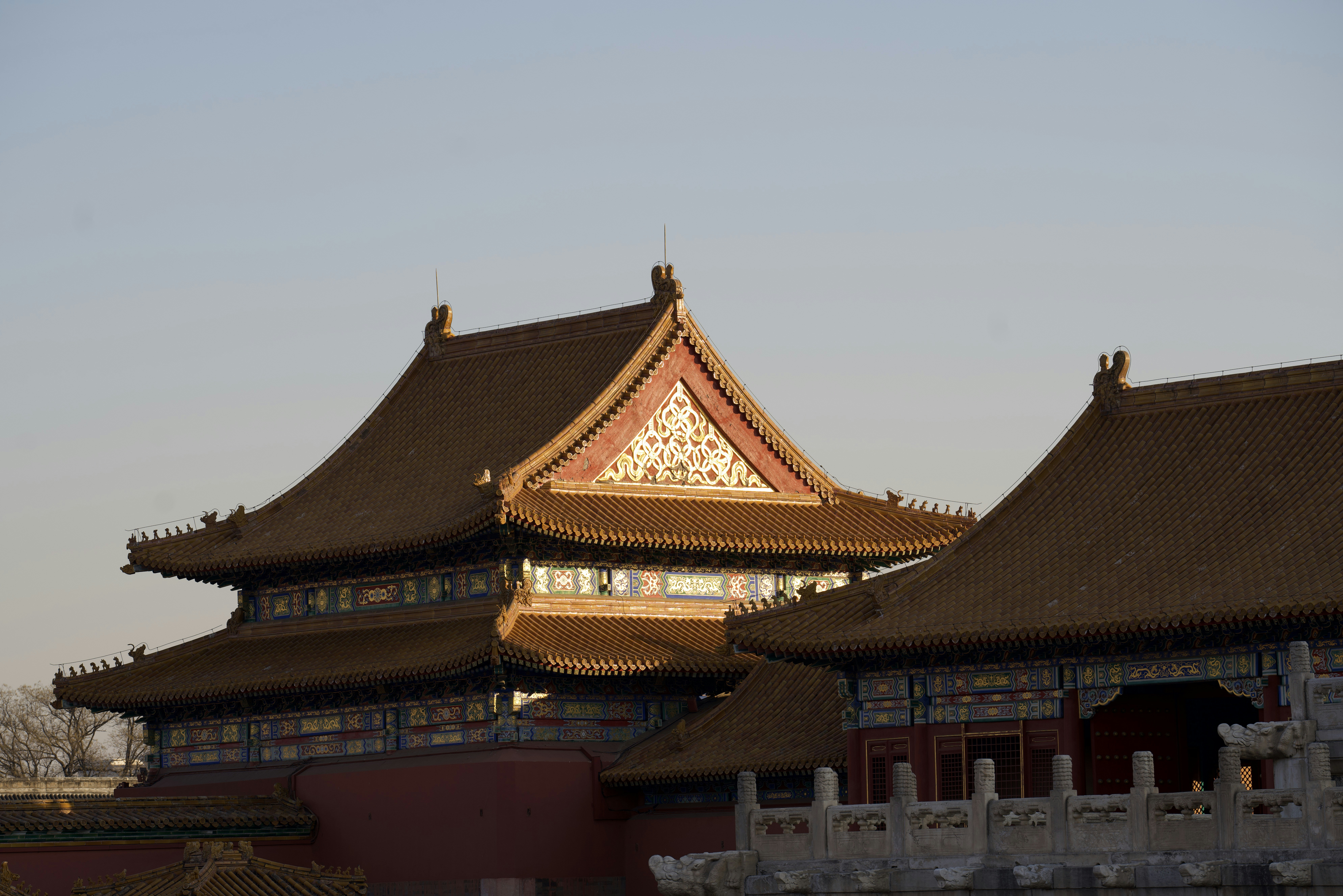 Traditional chinese palace architecture with ornate roofs