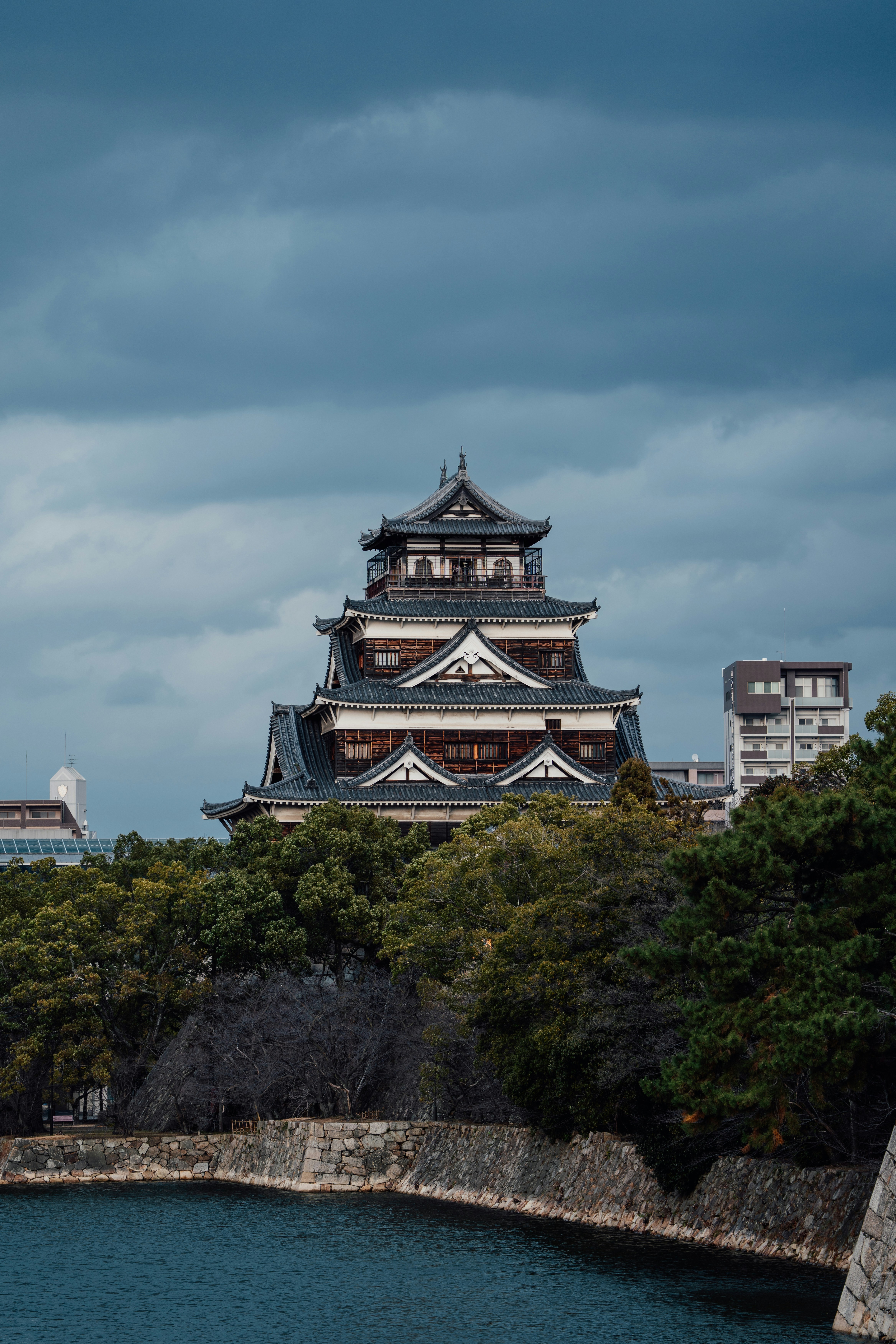 Historic japanese castle with dark, cloudy sky