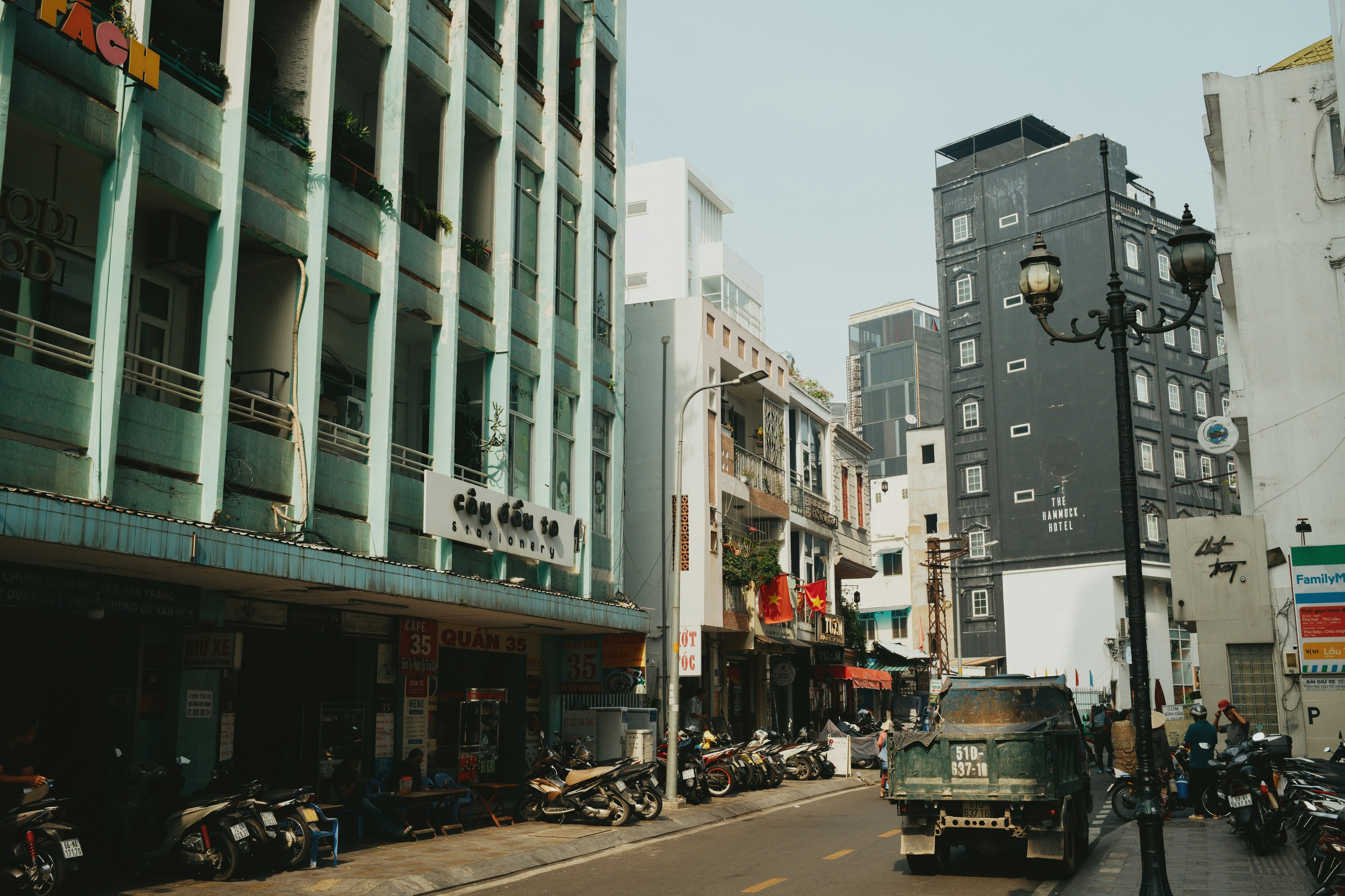 Street scene with buildings and parked motorcycles
