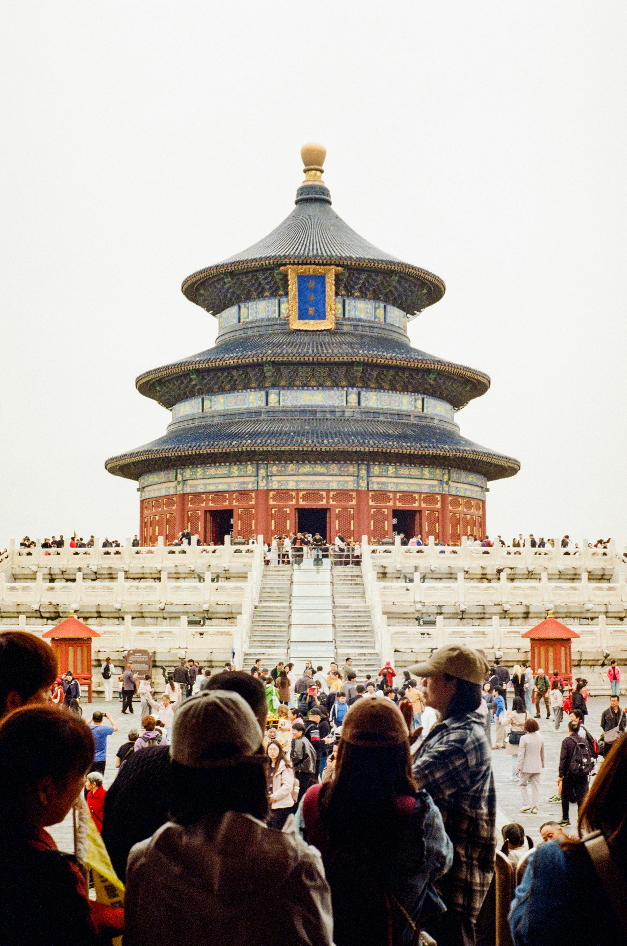 People gather at the temple of heaven in beijing.