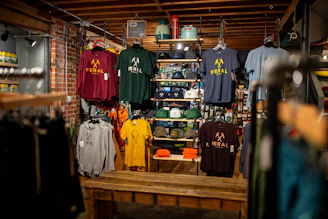 T-shirts and apparel displayed on store shelves
