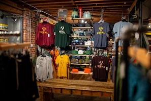 T-shirts and apparel displayed on store shelves
