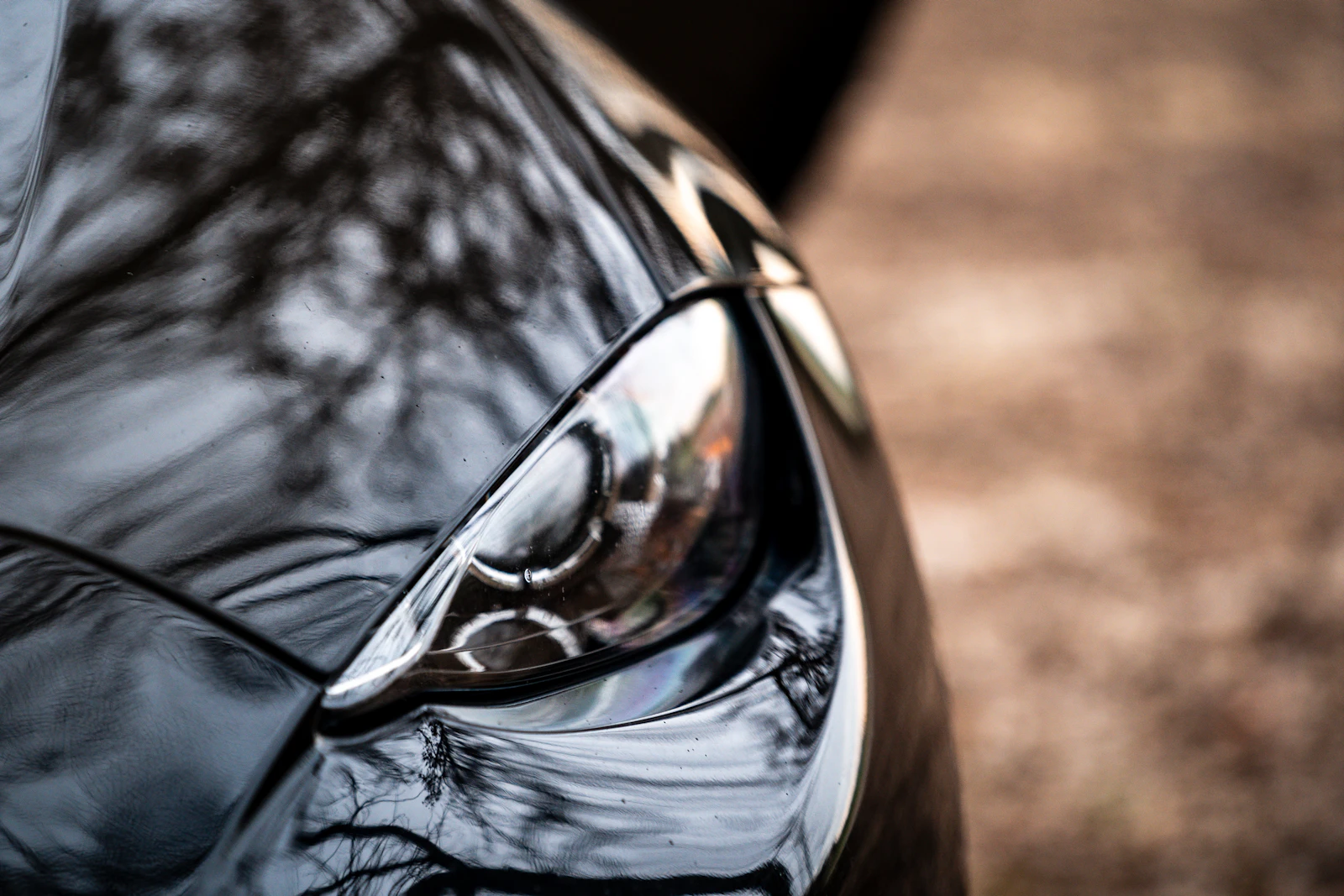 Crystal clear restored car headlight close up