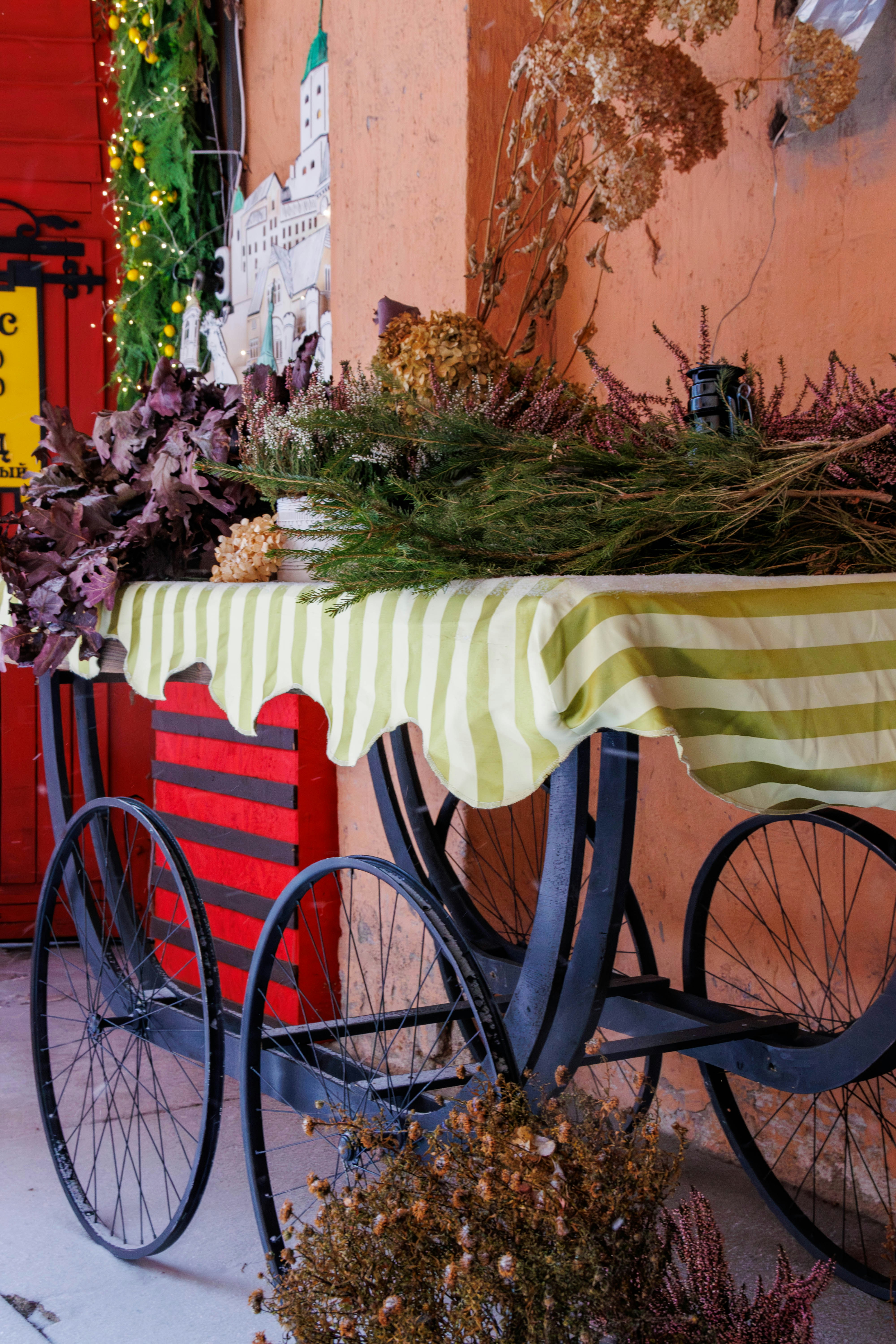 Decorative cart with dried flowers and striped box