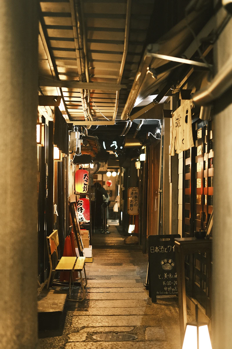 Narrow lantern-lit alley in Gion district, Kyoto at night