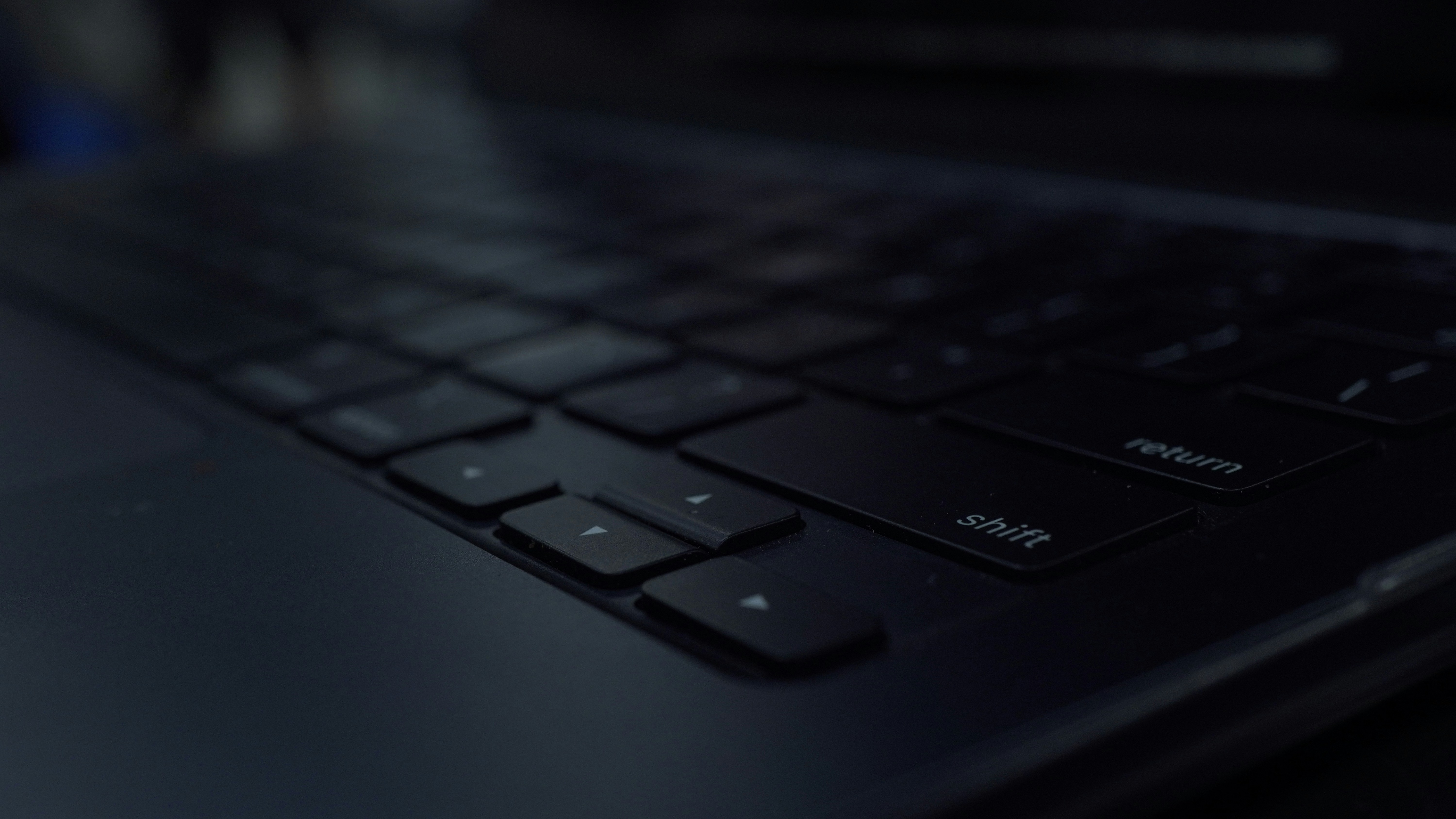 Close-up of a dark computer keyboard