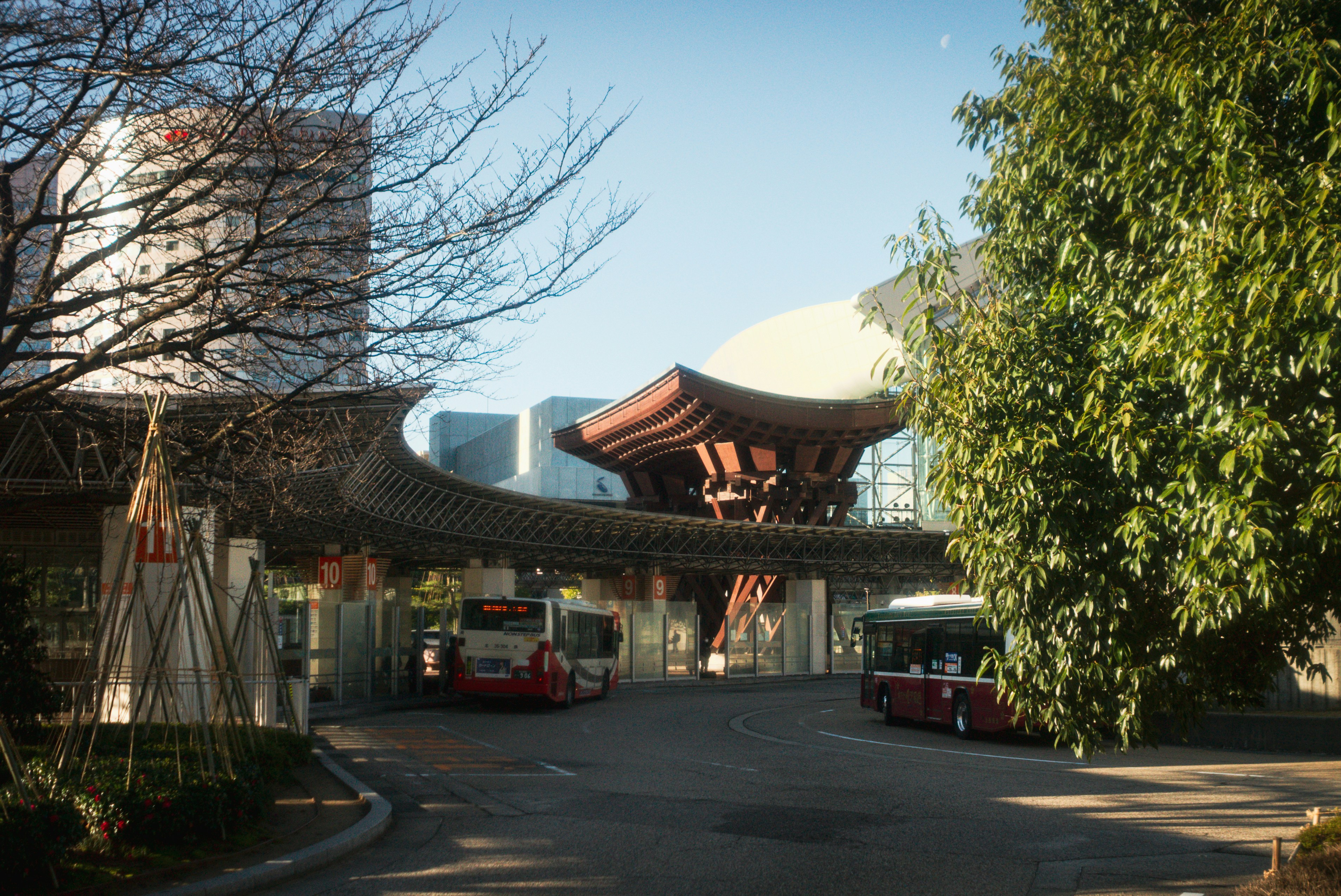 Modern building entrance with traditional japanese roof design