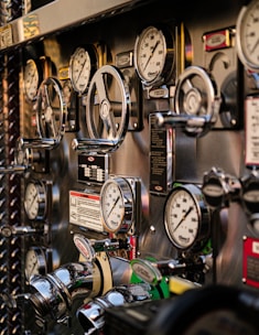 Close-up of gauges and valves on a fire truck.