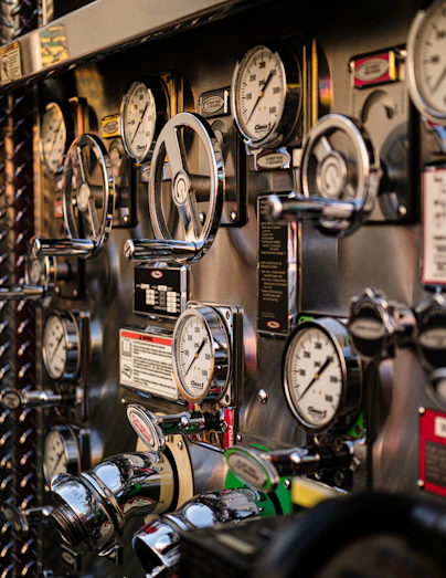 Close-up of gauges and valves on a fire truck.