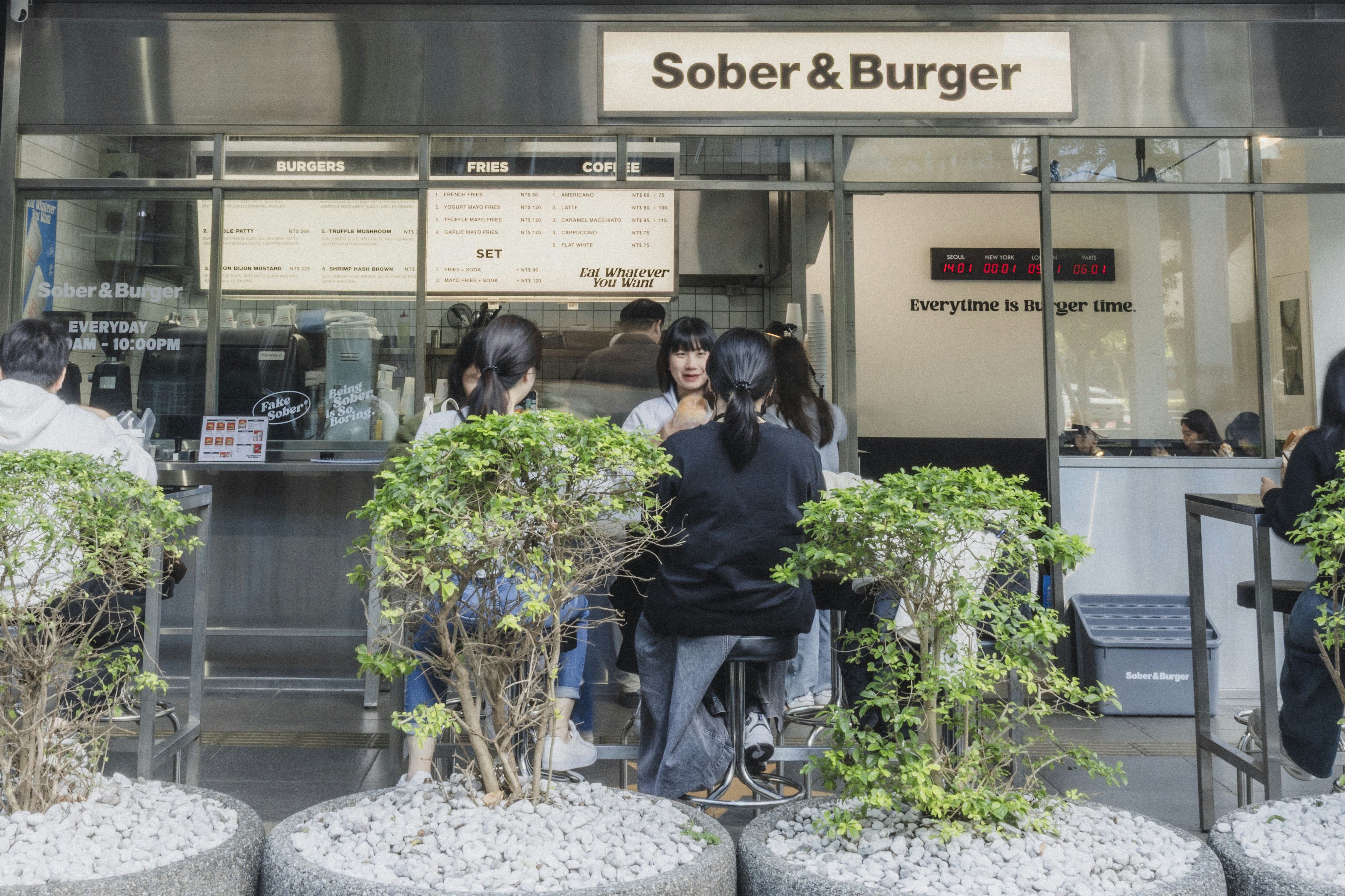 people eating burgers