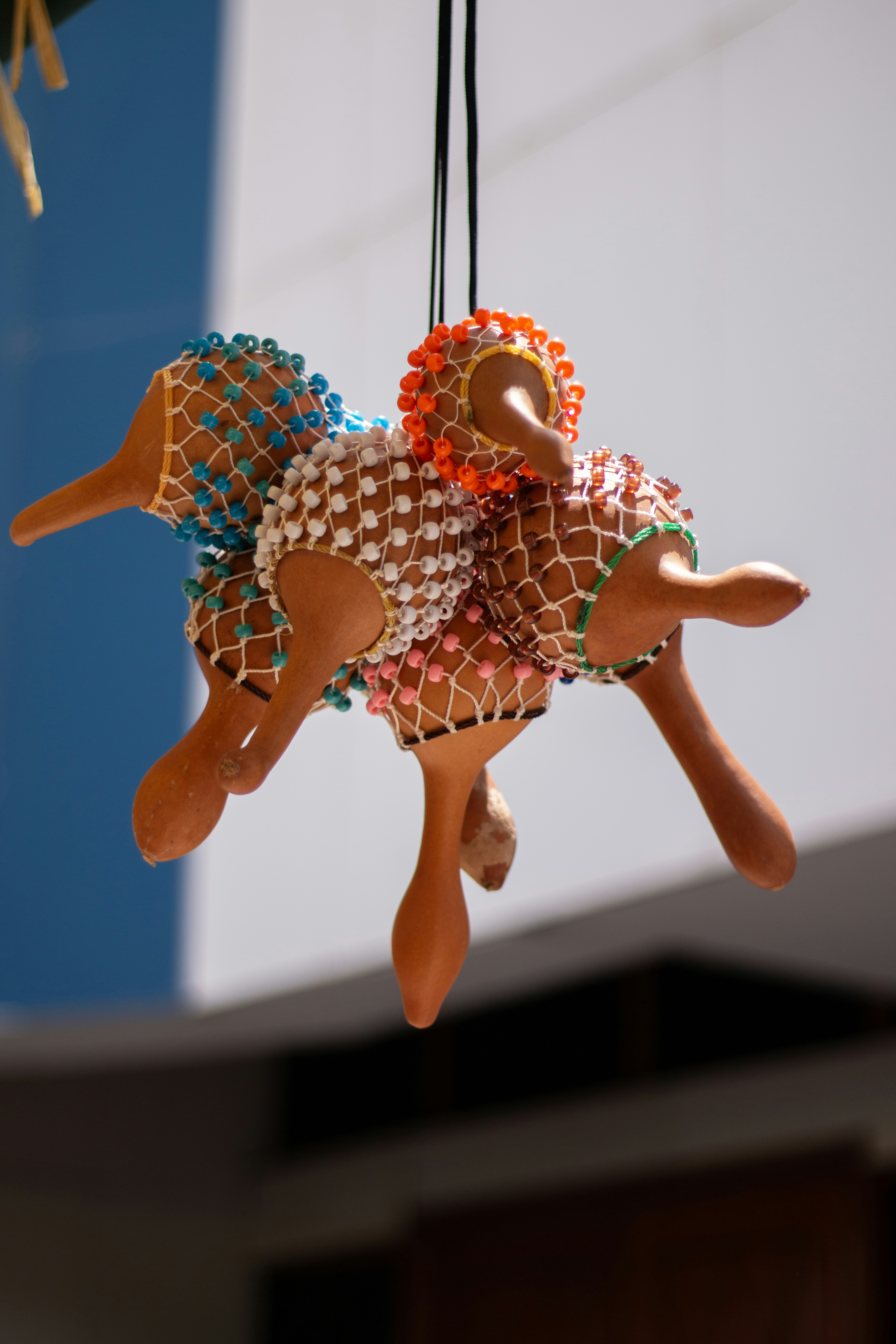 Colorful maracas hanging together outdoors