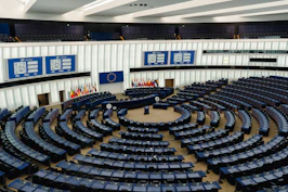 Modern parliamentary chamber with tiered seating