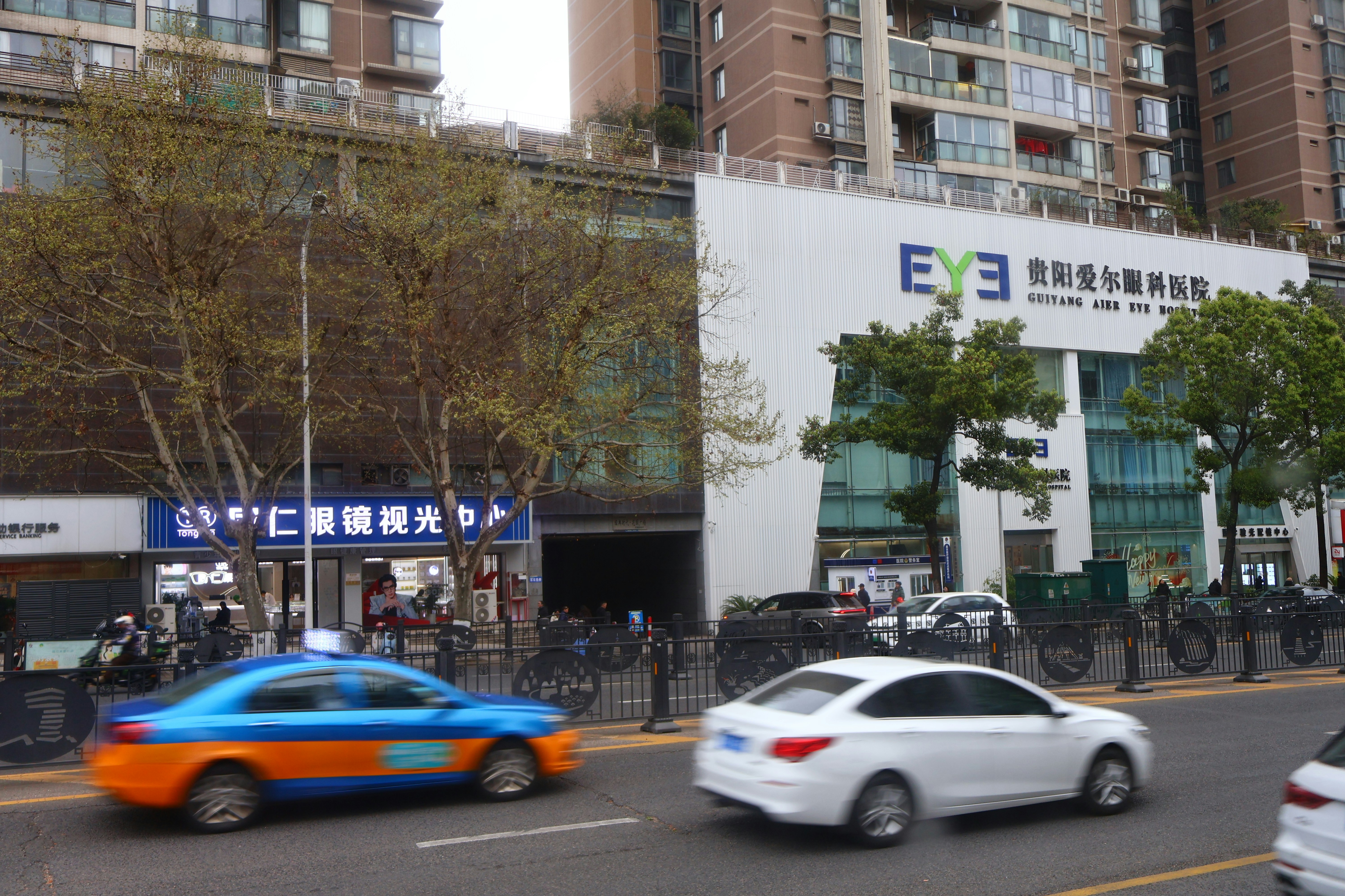 City street with cars and buildings