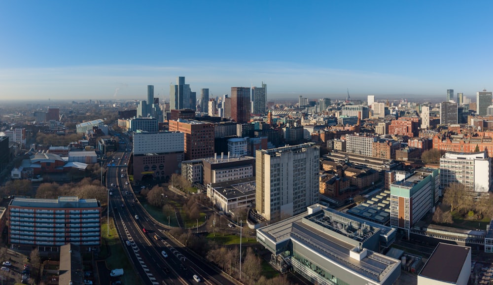 Manchester skyline showing modern commercial buildings and the city centre — serviced apartments sourcing by Jigsaw Conferences