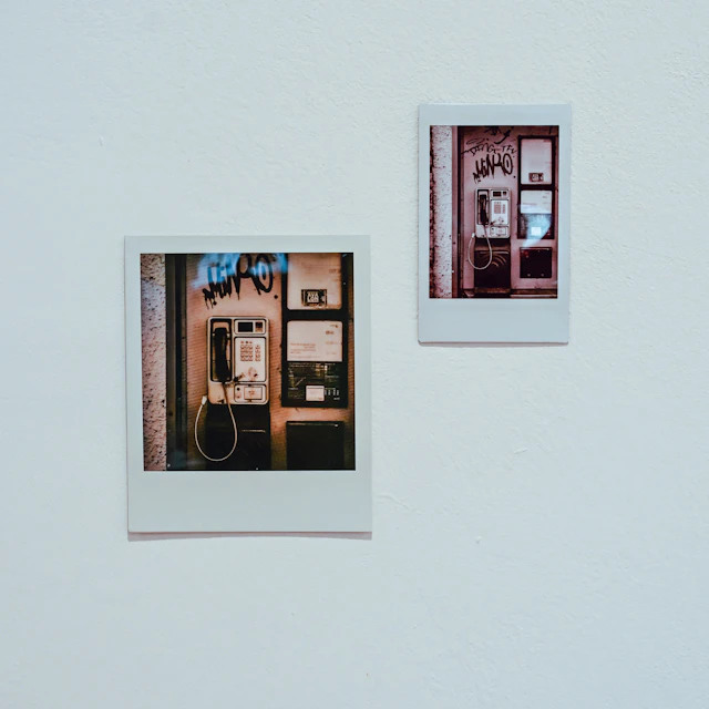 Two instant photos of vintage payphones on a wall