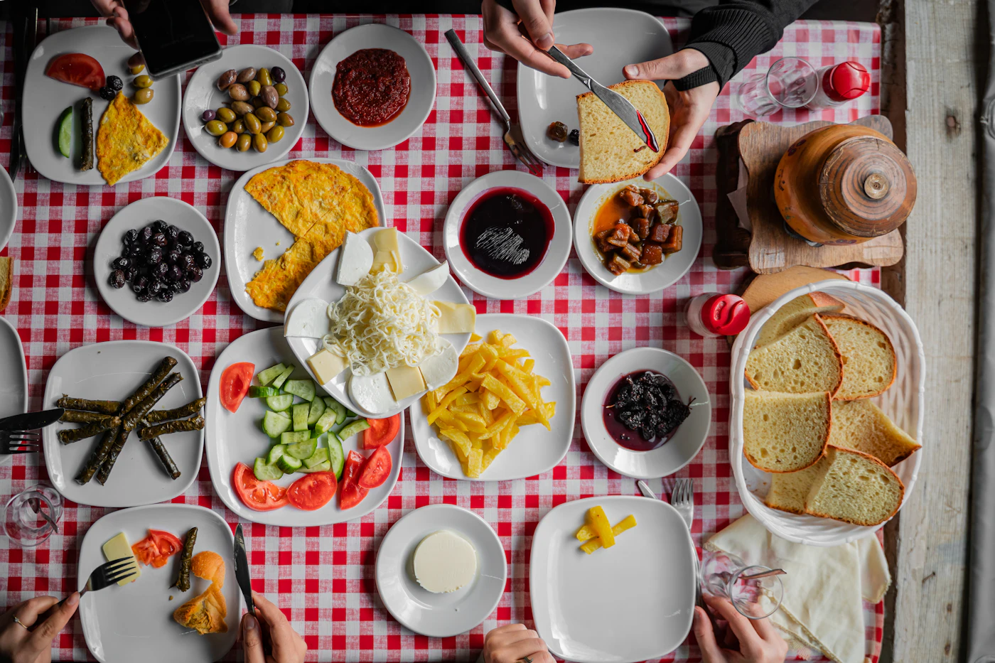 Shared table with a generous homemade breakfast