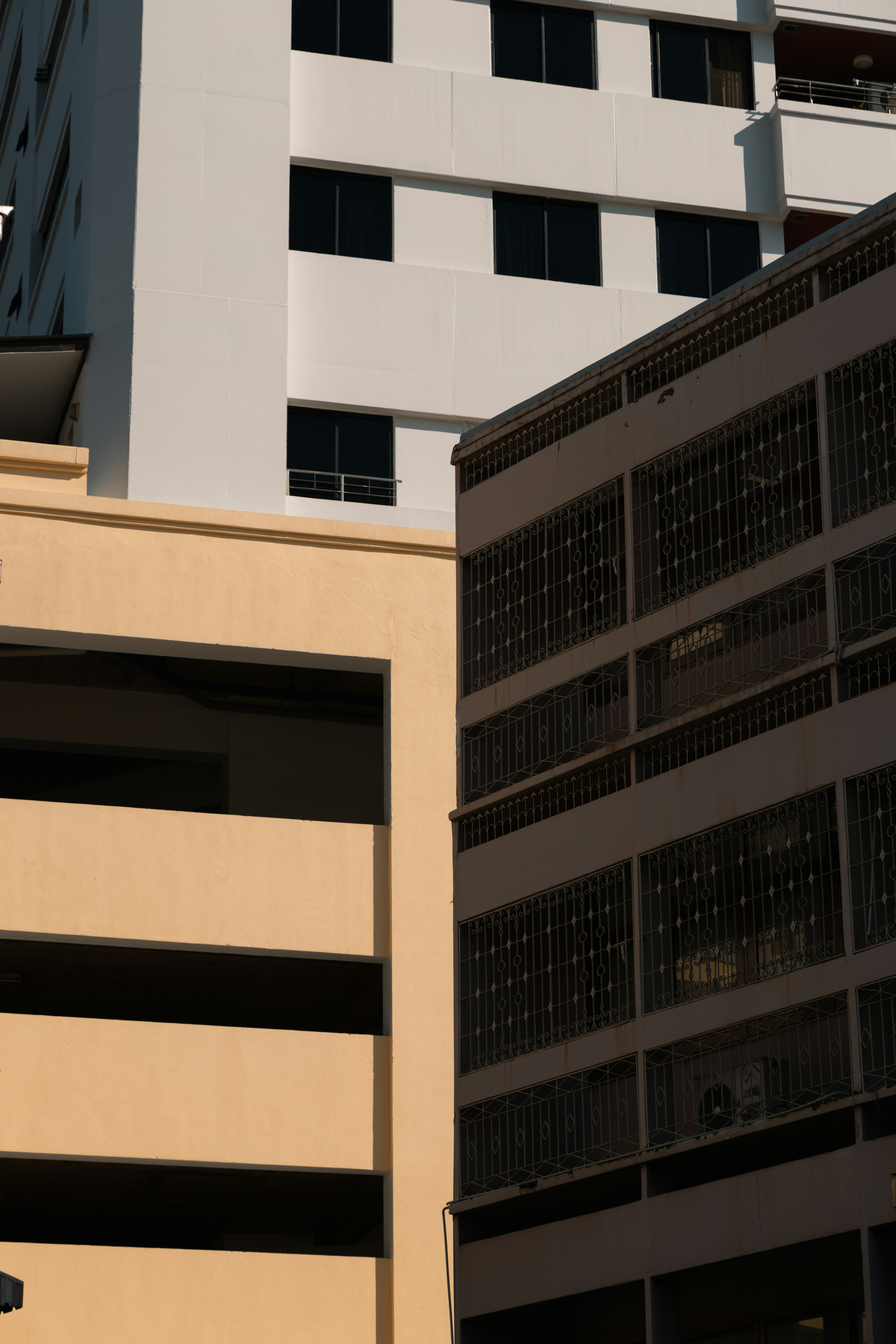 Modern buildings with geometric patterns and shadows