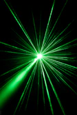 Green laser beams radiating from a central point