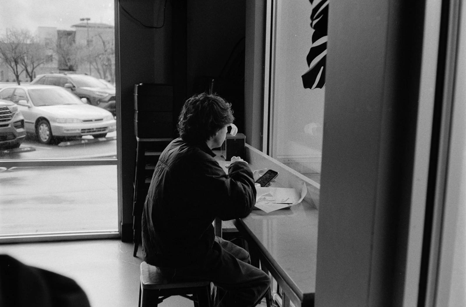 Person using a phone during some spare time at home