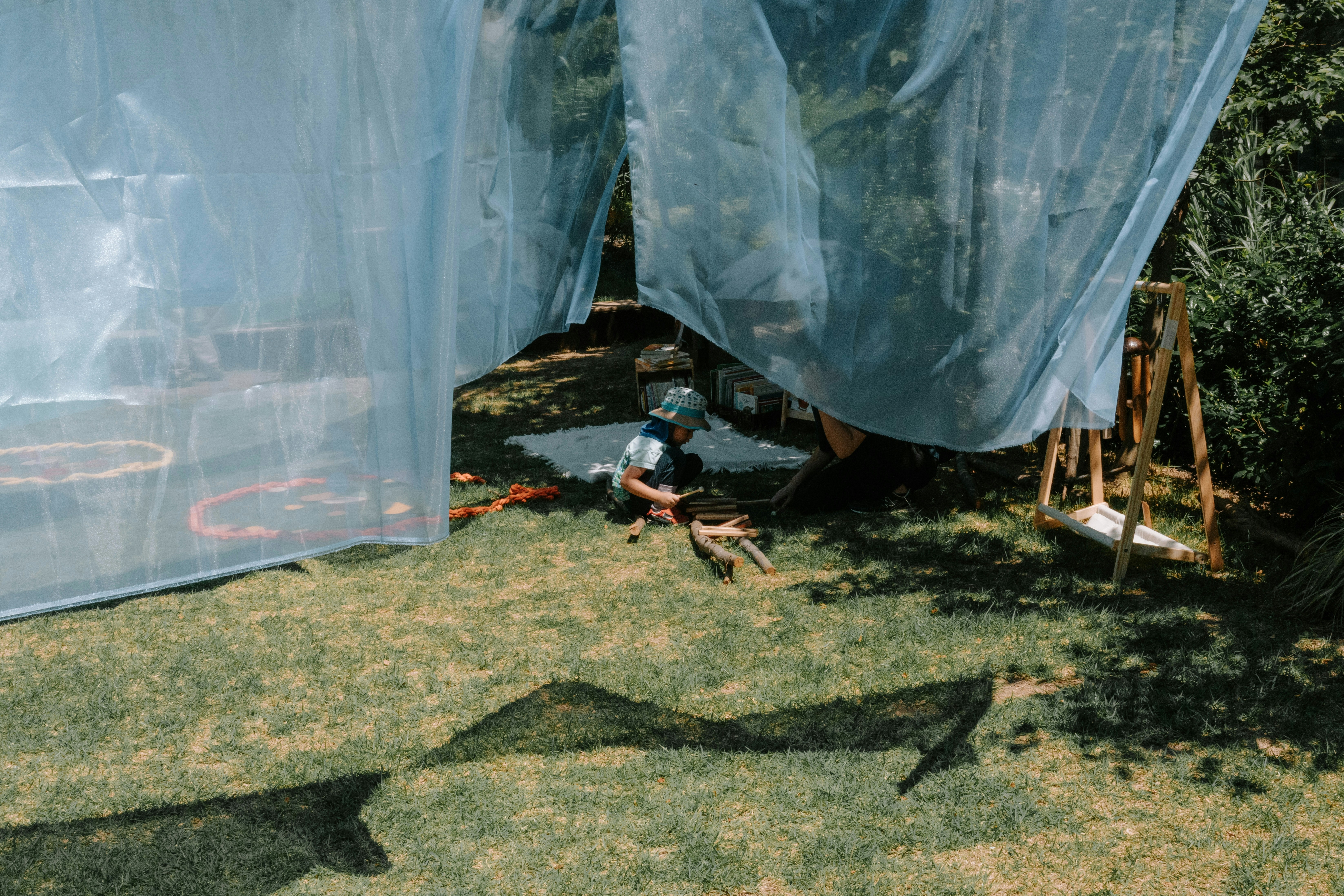 A warm, wool rug under a child's play tent