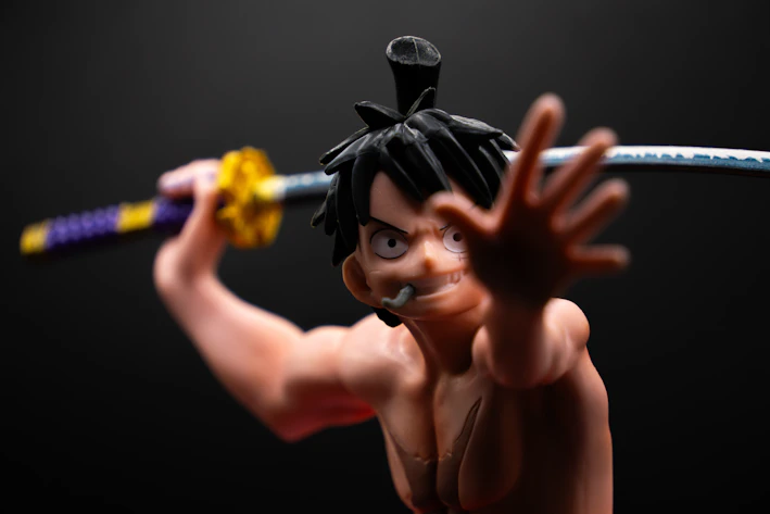 Anime character with sword in dynamic pose