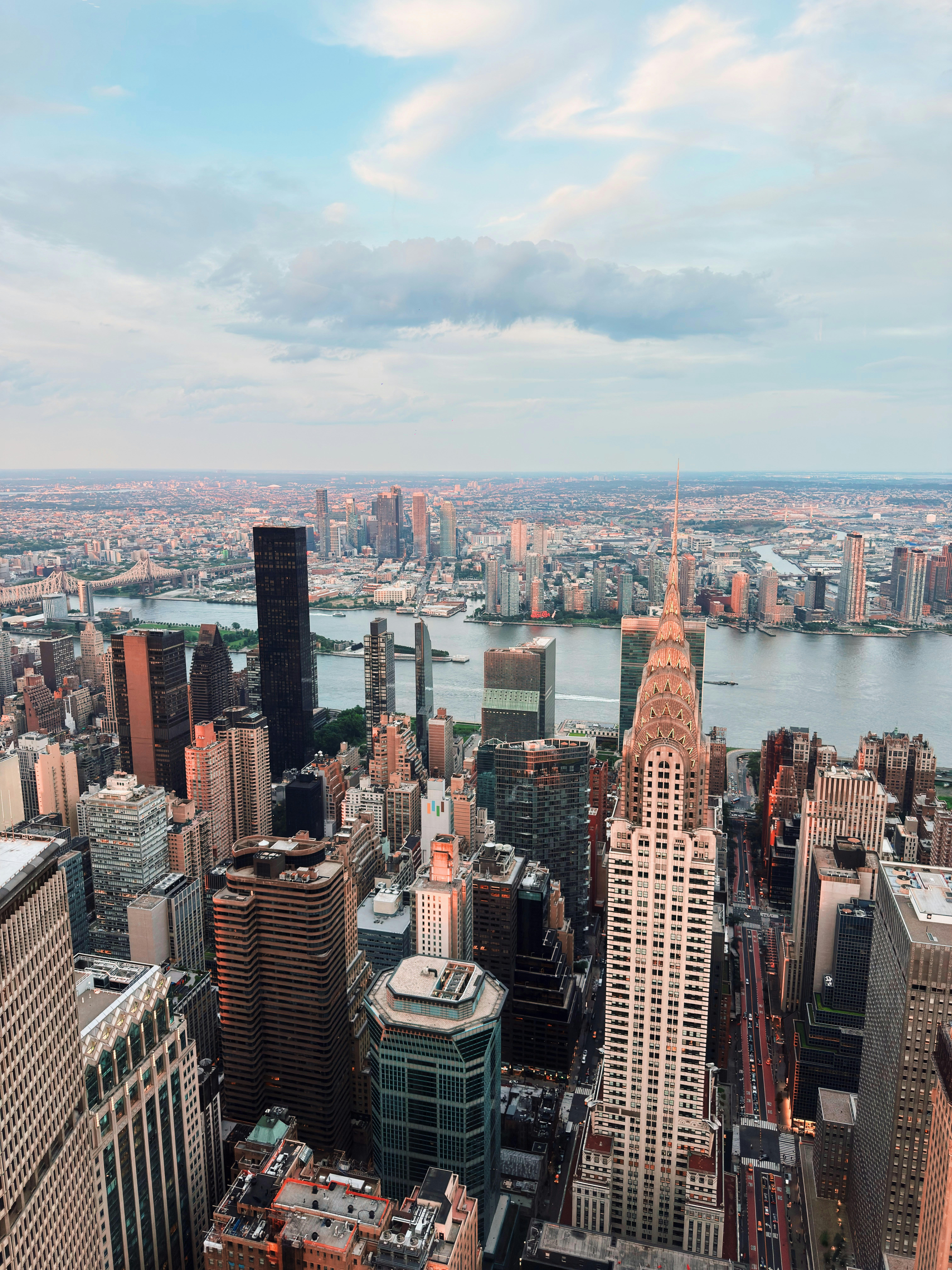 Aerial view of new york city skyline at dusk.