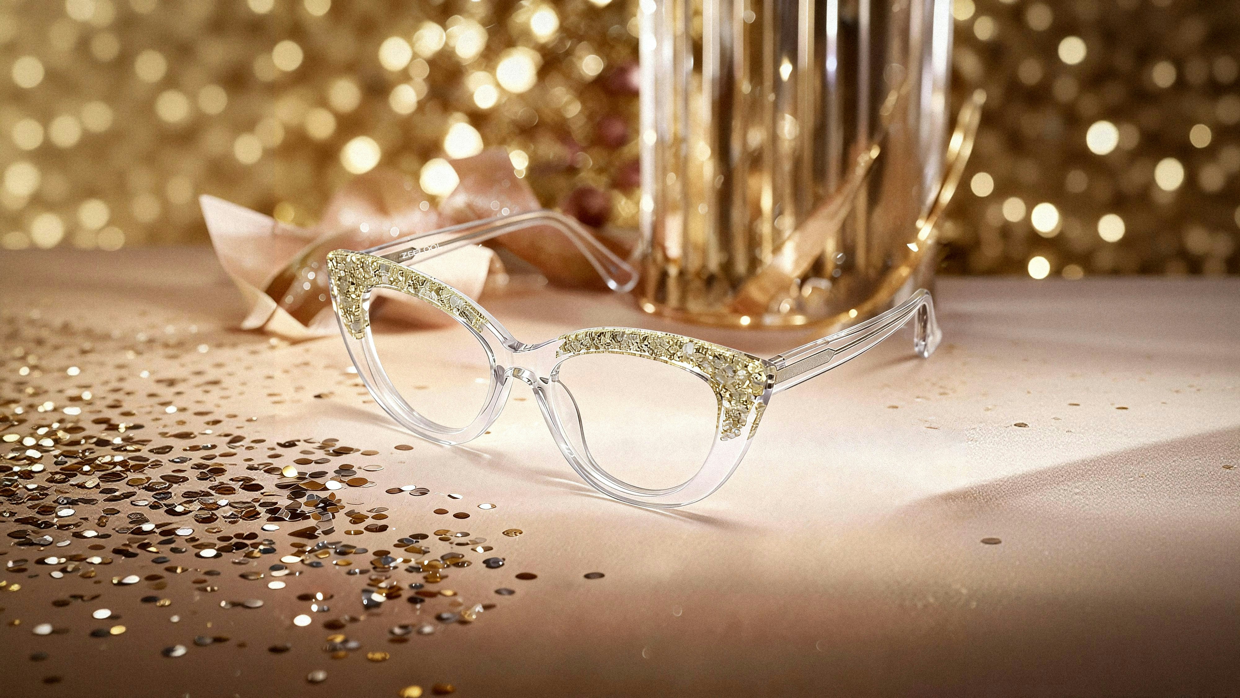 Sparkling cat-eye glasses with gold glitter and bokeh lights