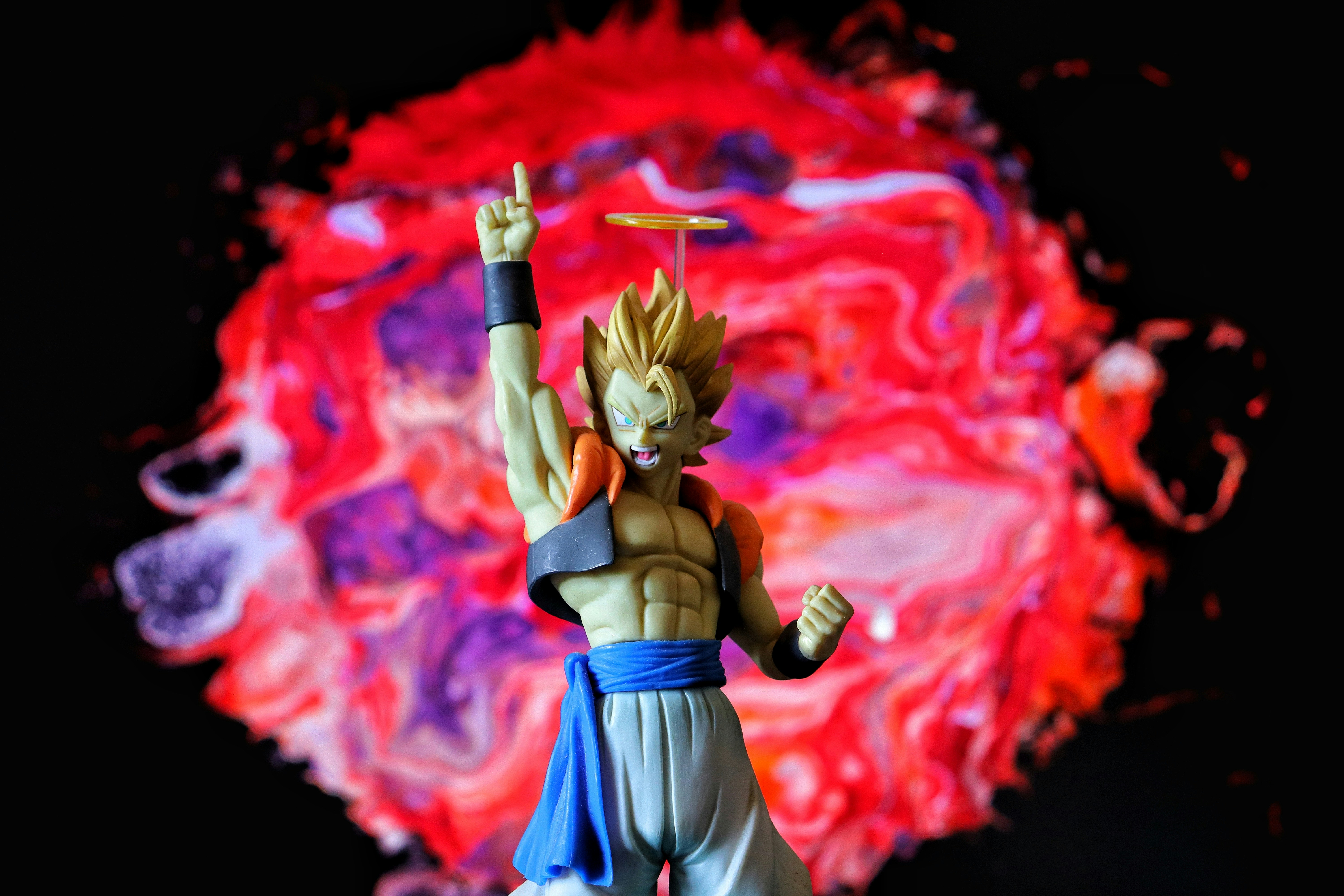 Action figure with colorful explosion background