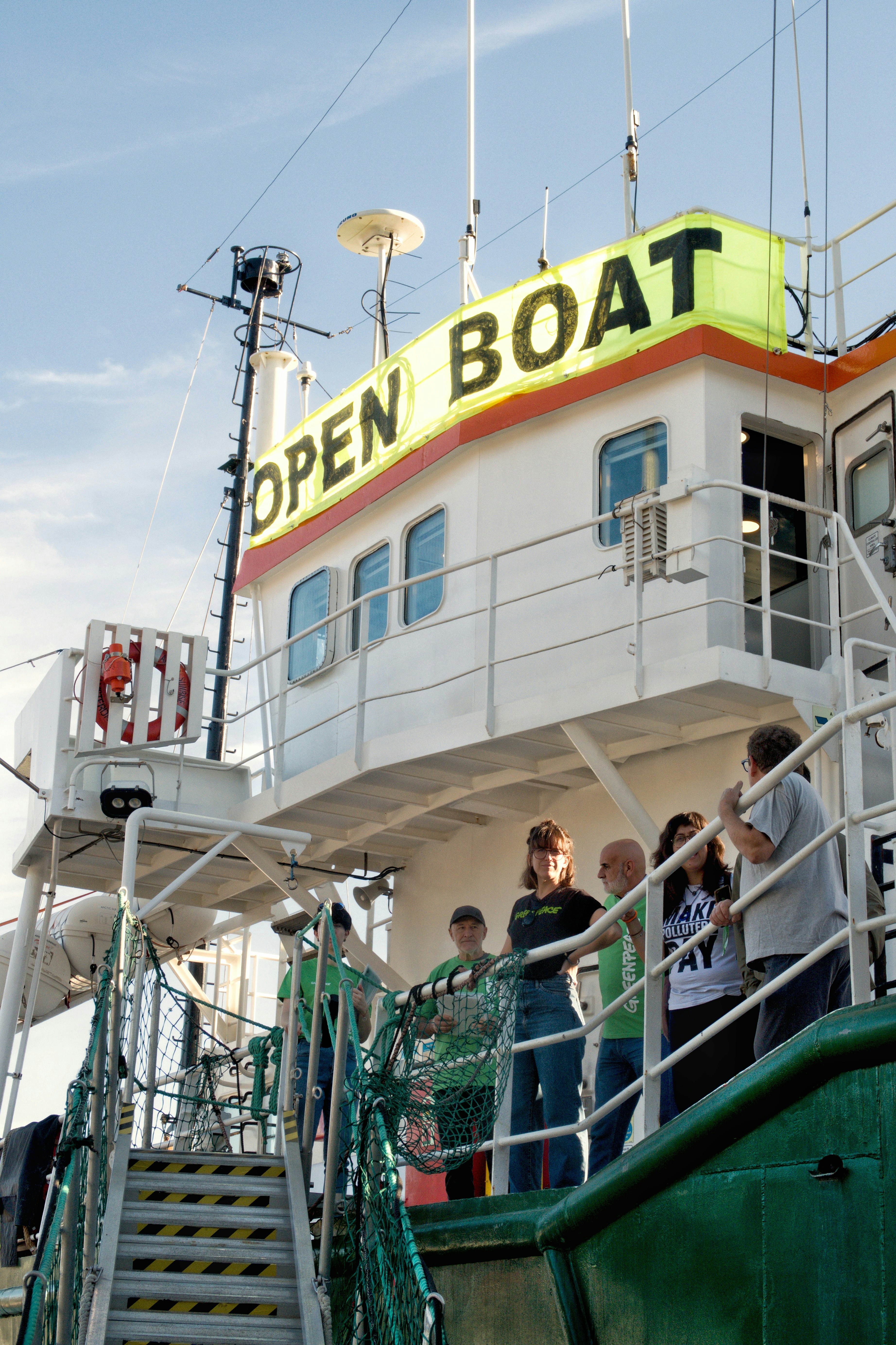 People standing on the deck of an 