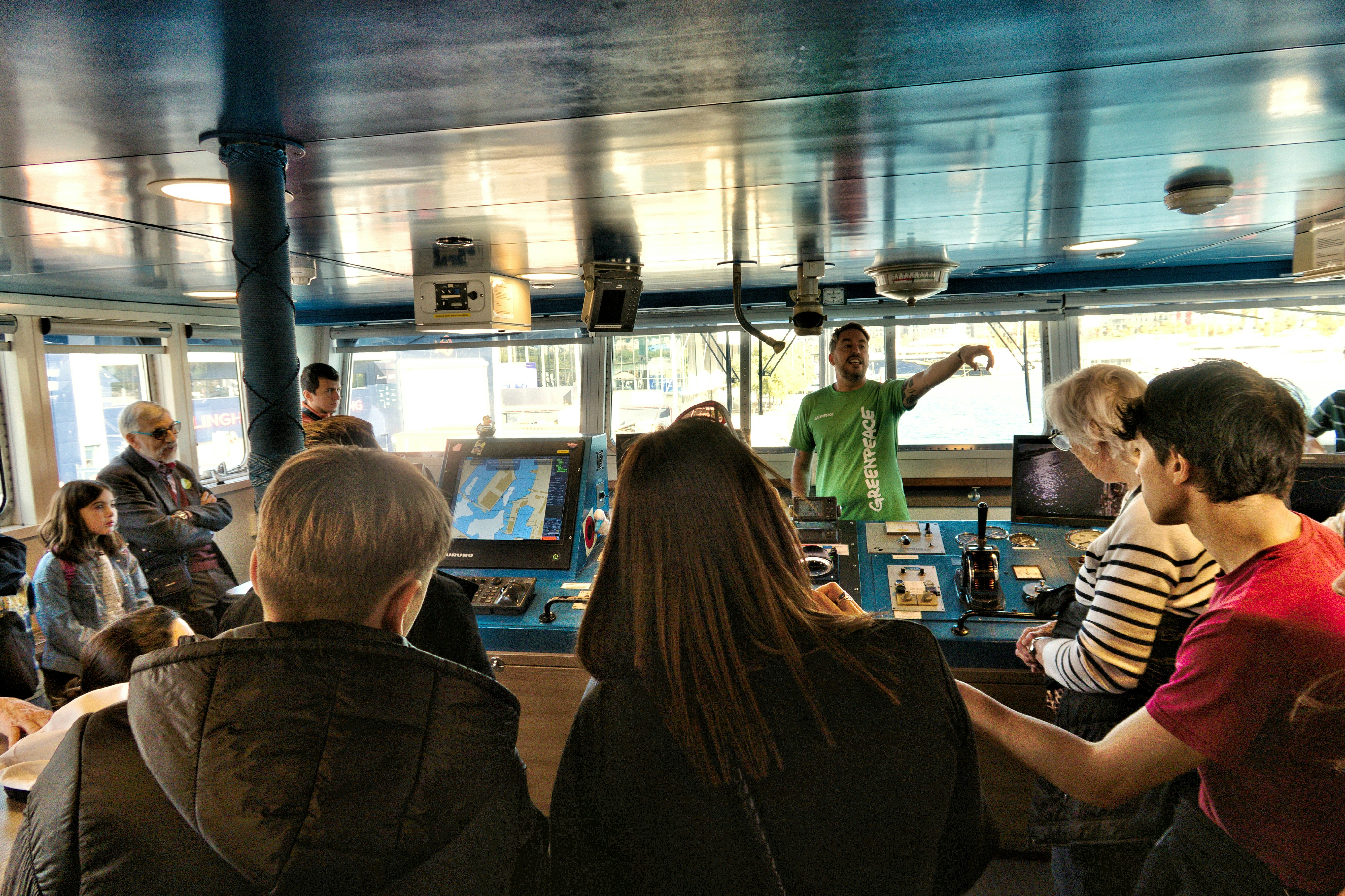 Guide giving a pre-tour briefing on a boat - Professional snorkel guides