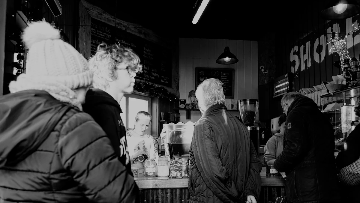 Customers gathered along a busy counter