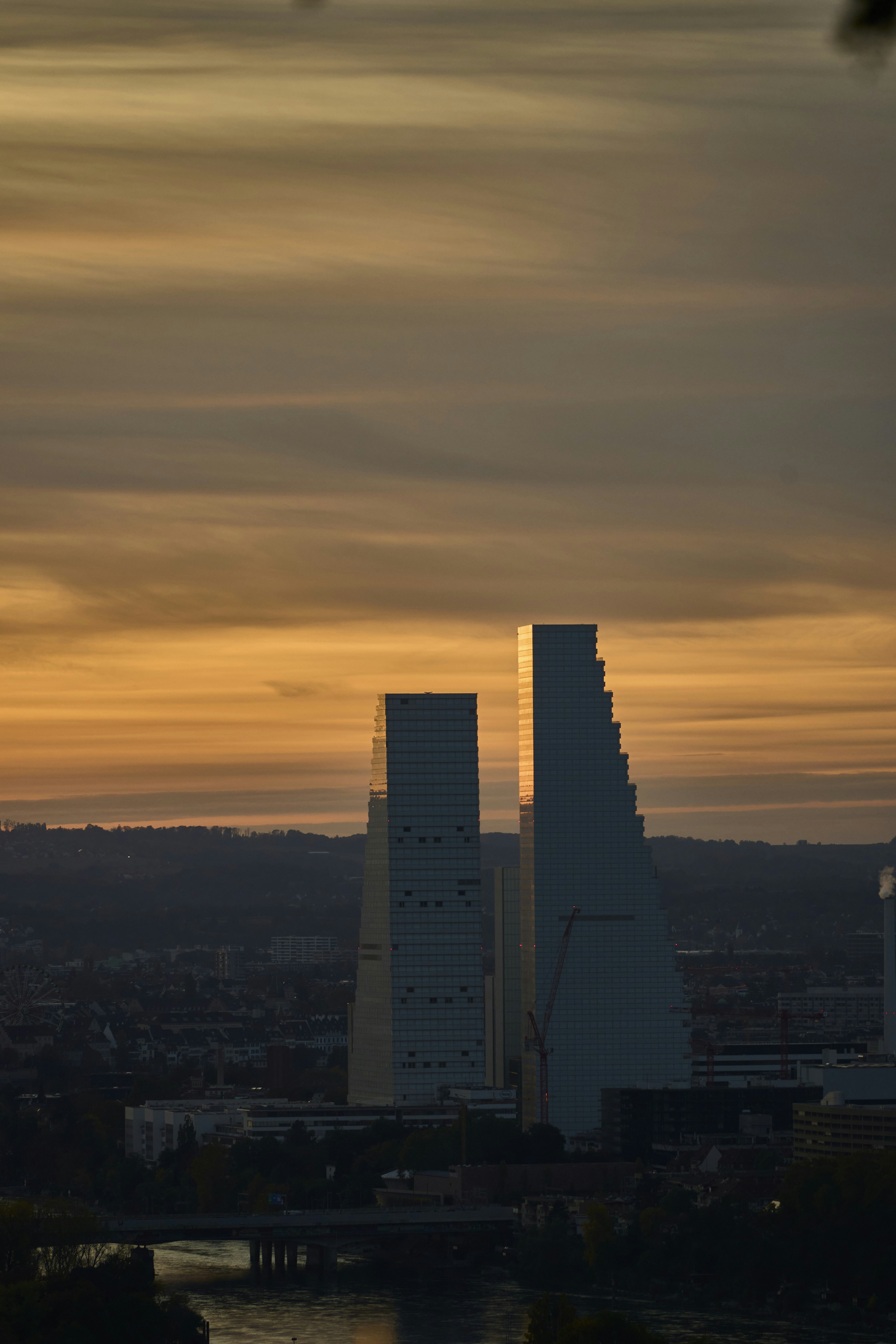 Modern skyscrapers illuminated by sunset light